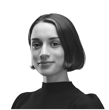 Black and white portrait of a woman with short hair wearing a high-neck top.