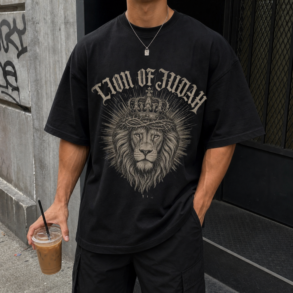 Man wearing a black Lion of Judah Revelation 5:5 vintage Christian t-shirt
