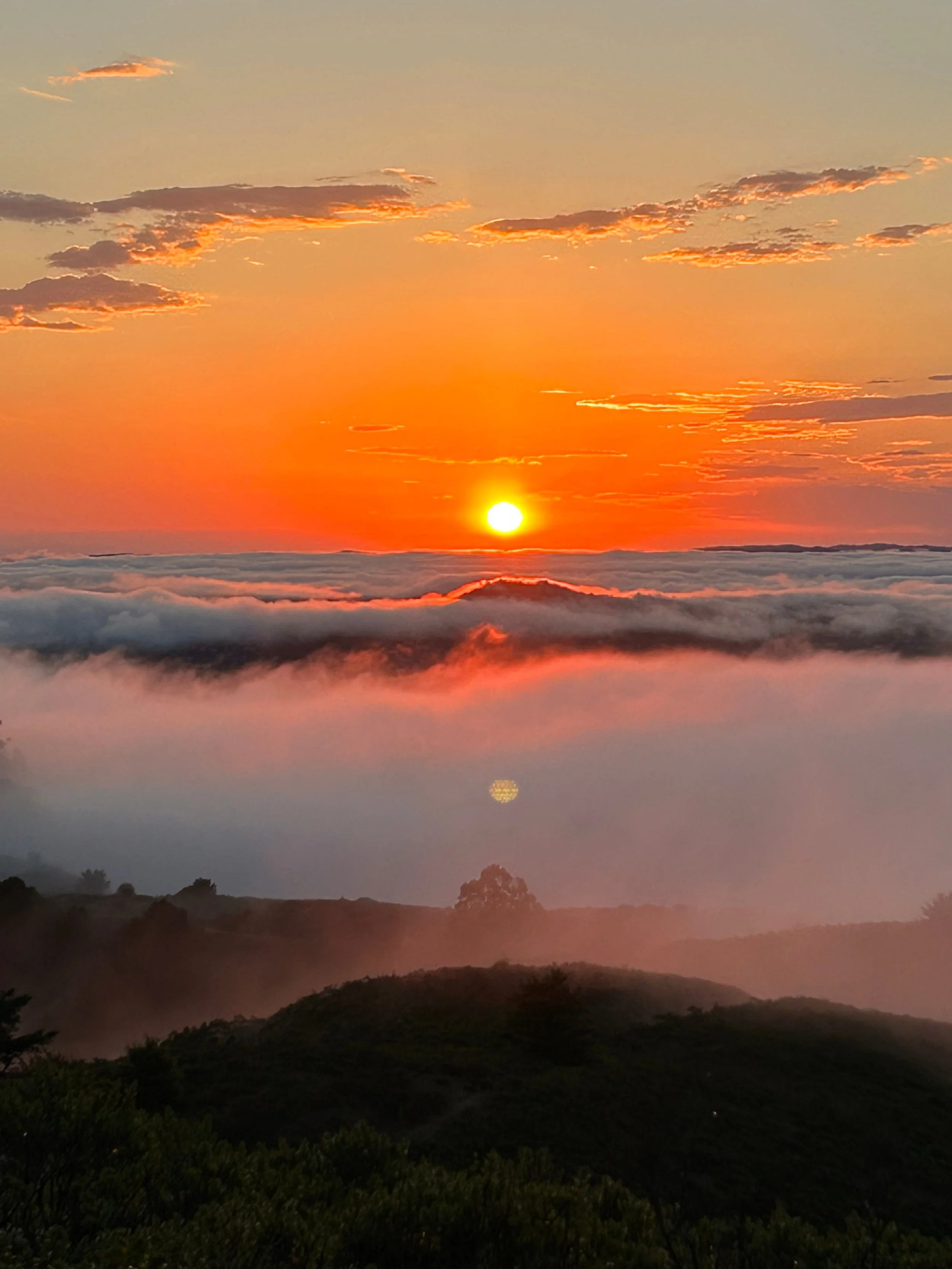 Sunset over fog