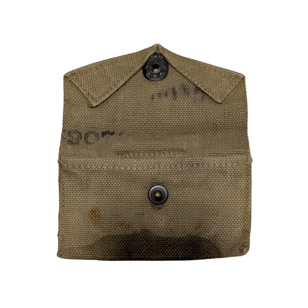 Original U.S. WWII M1942 First Aid Kit Pouch Flap.png