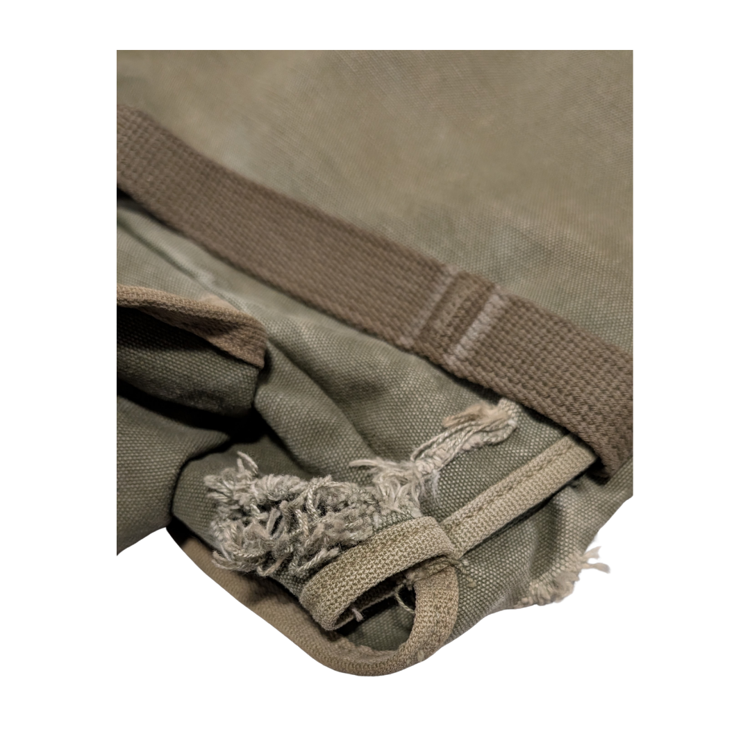 Original U.S. WWII M1936 Musette Bag Damage.png