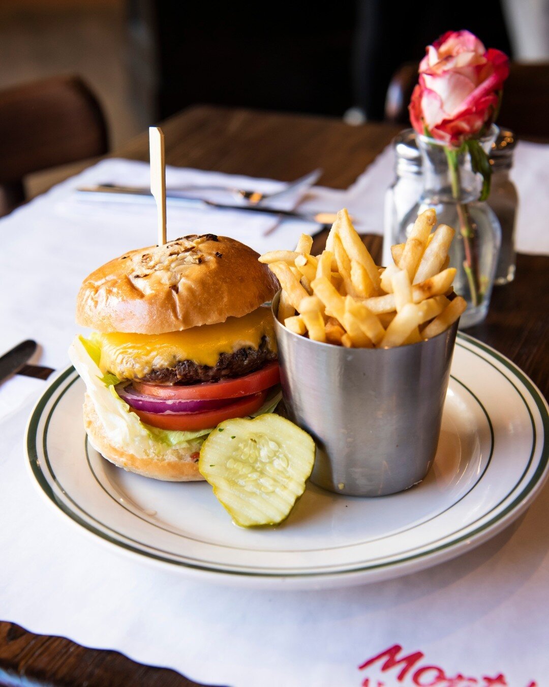 Monte's Classic Cheeseburger hits the spot every time. Available for Lunch and Dinner. ⁠
⁠
Pictured: Onion Brioche, Gruyere, Premium Ground Beef, and Truffle Parmesan Fries.⁠
⁠
#cheeseburger #montauk #montesatthemanor