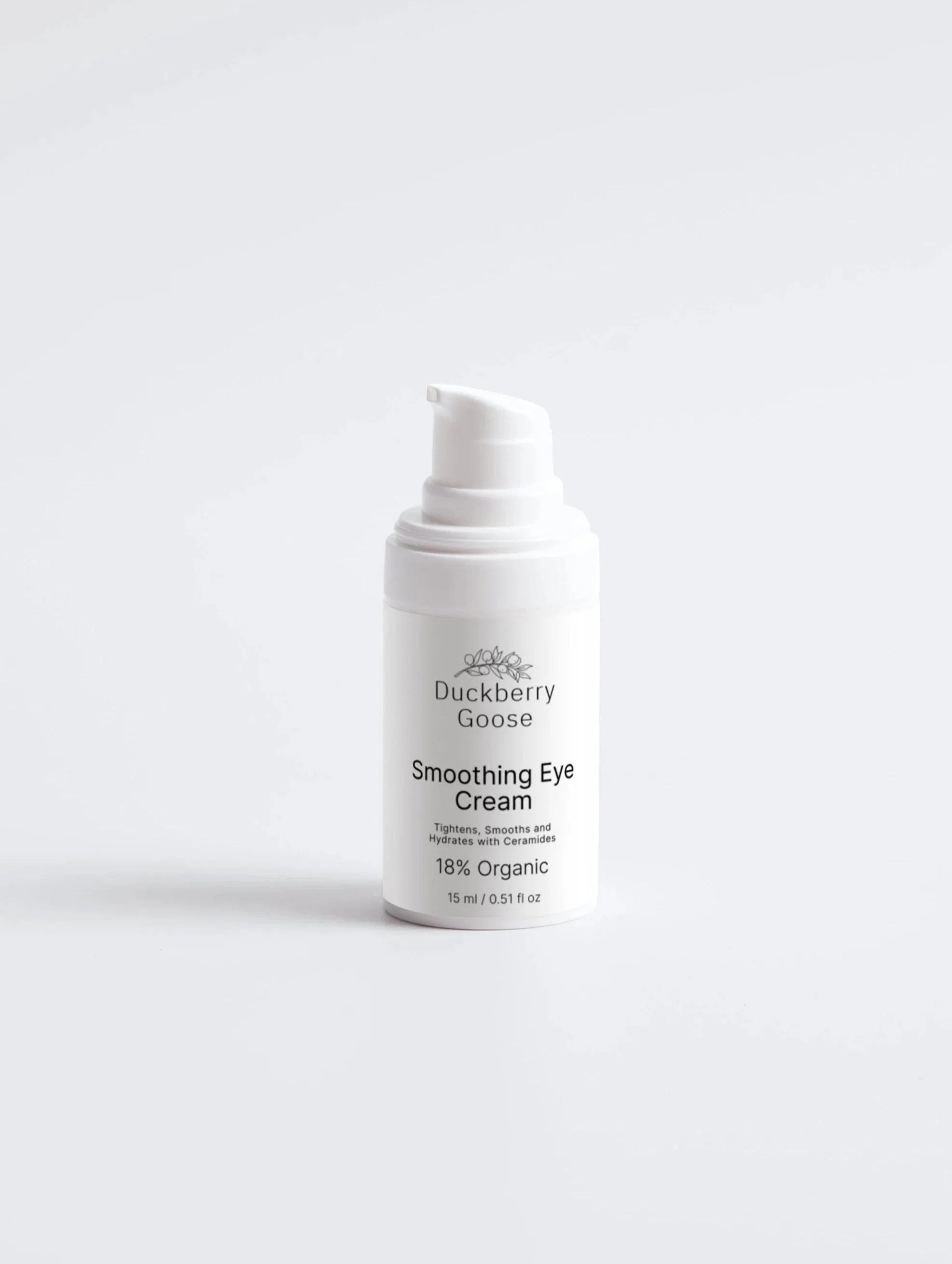 Small white pump bottle with white box next to it. Writing says Smoothing Eye Cream from Duckberry Goose Irish Premium Skincare