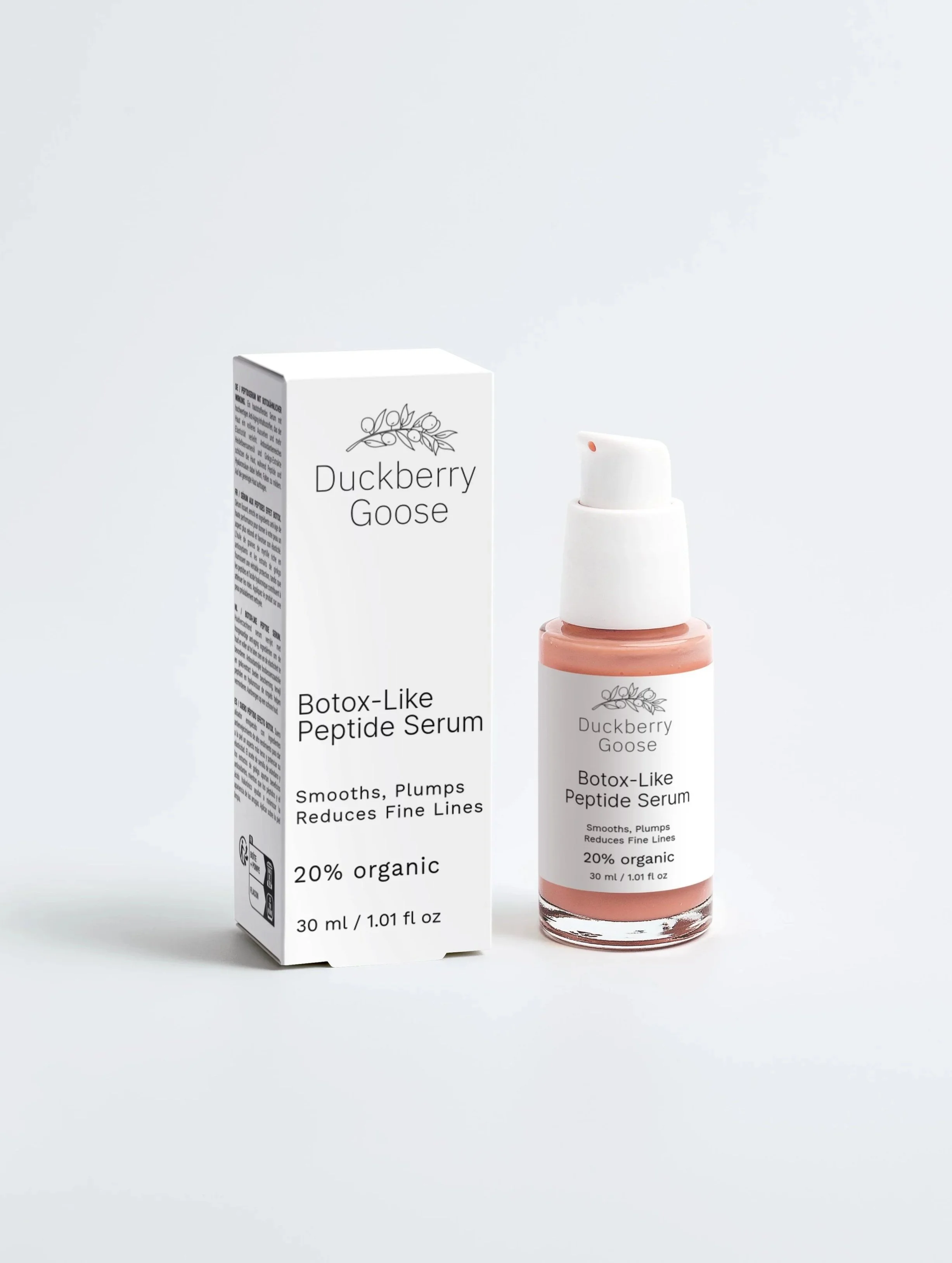 Pink Serum bottle with white box with product information on High Performance Peptide Serum for face by Duckberry Goose Brand