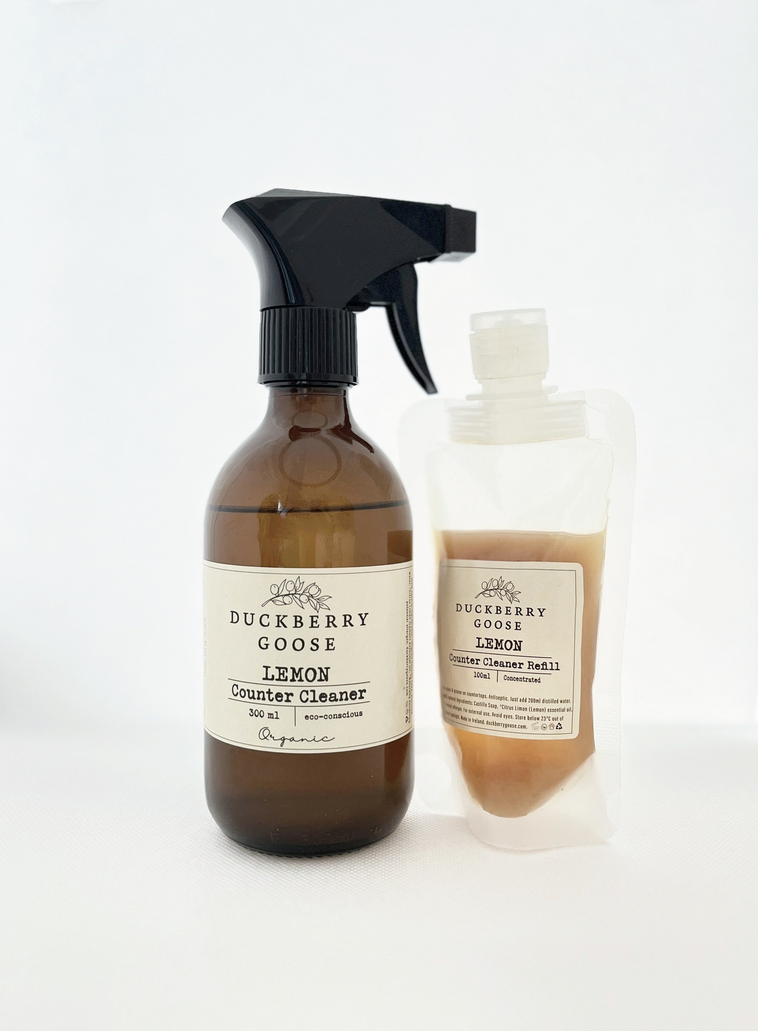 Organic Counter Cleaner glass bottle and refill pouch in Lemon