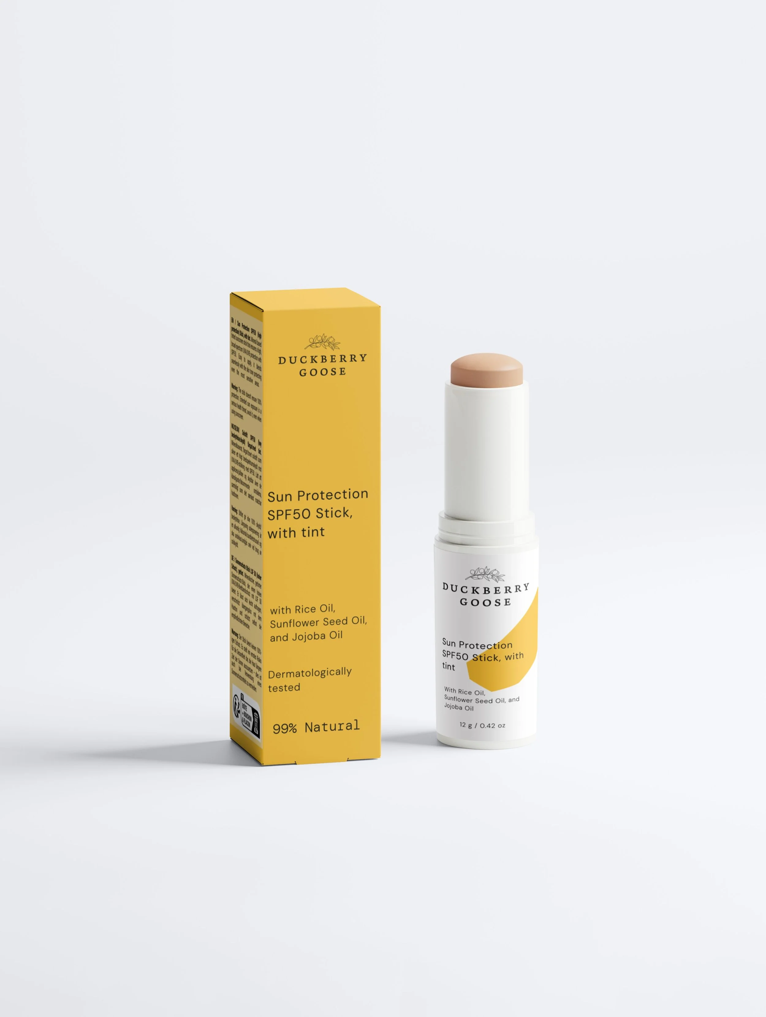 SunStickFront, with yellow box, yellow smear design on front of the stick, slightly sticking out to show the tinted solid sunblock stick.