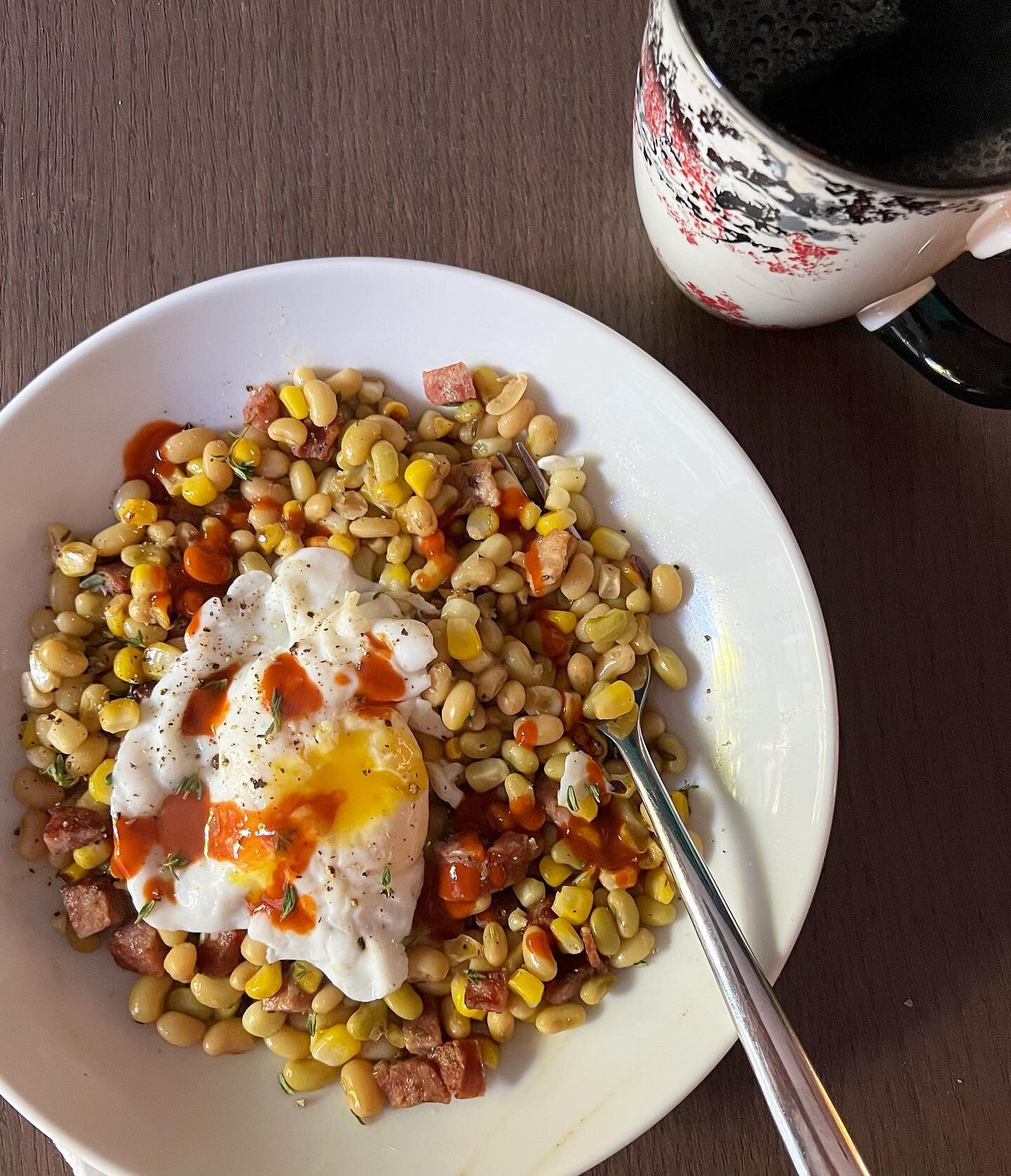 Leftover lady peas for breakfast! With corn, a little #conecuhsausage, a mangled (but delicious) poached egg, and some hot sauce. As we sometimes say, &ldquo;It&rsquo;ll eat.&rdquo; PDG, tbh. #ladypeas #fieldpeas #breakfast #leftovers