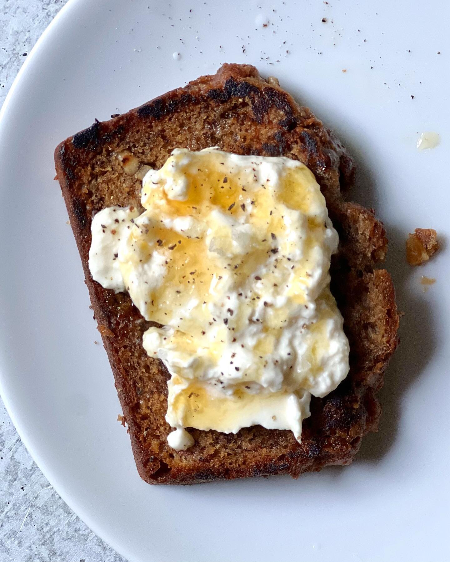 In case you&rsquo;ve ever wondered what it would be like to toast a slice of banana bread and top it with burrata, honey, flaky salt, and pepper, I can report that it is quite good. #bananabread #burrata #indulgentbreakfast
