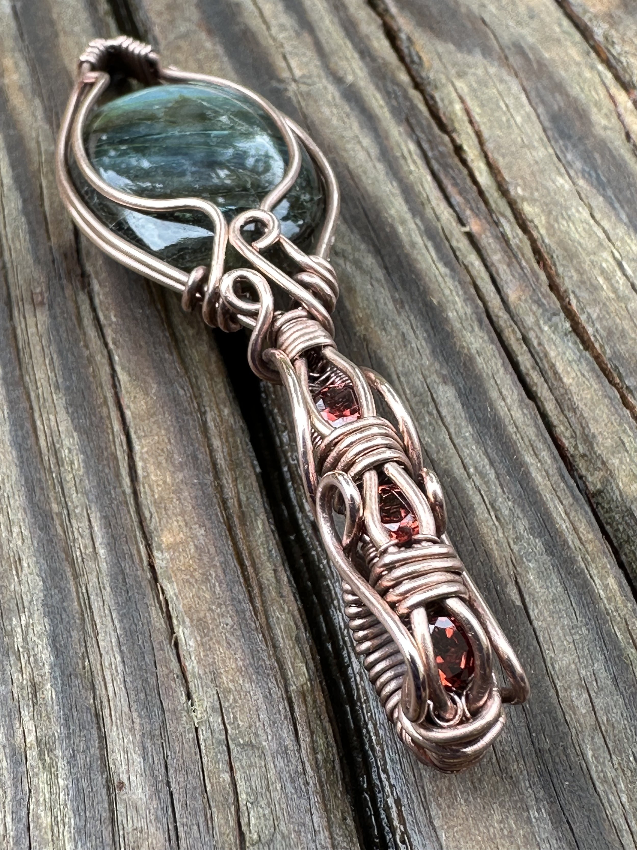 labradorite almandine garnet wire wrapped pendant.4.jpeg