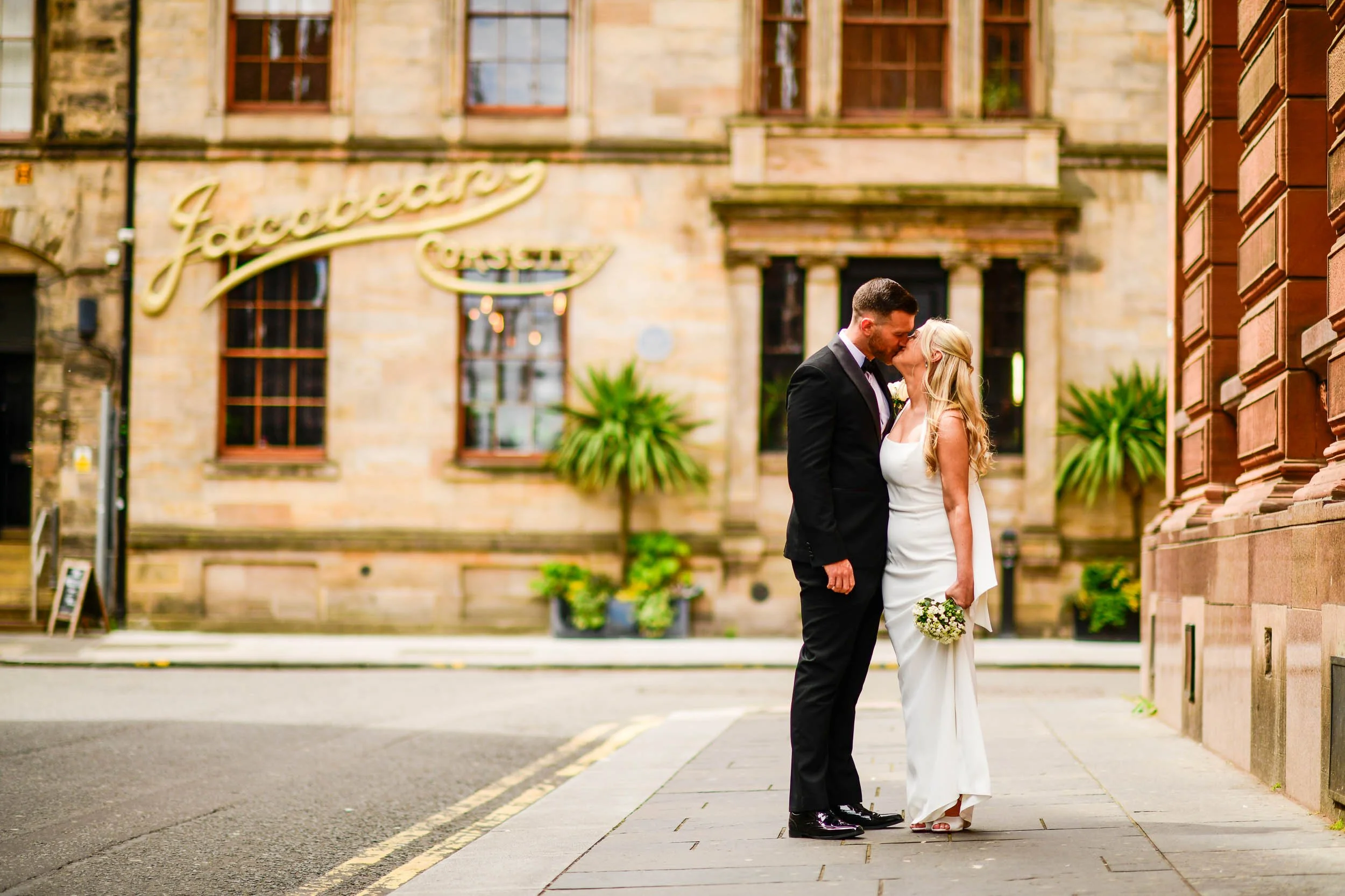 Glasgow City centre wedding with the bride and groom in the Merchant City after tying the knot at 23 Montrose Street. 