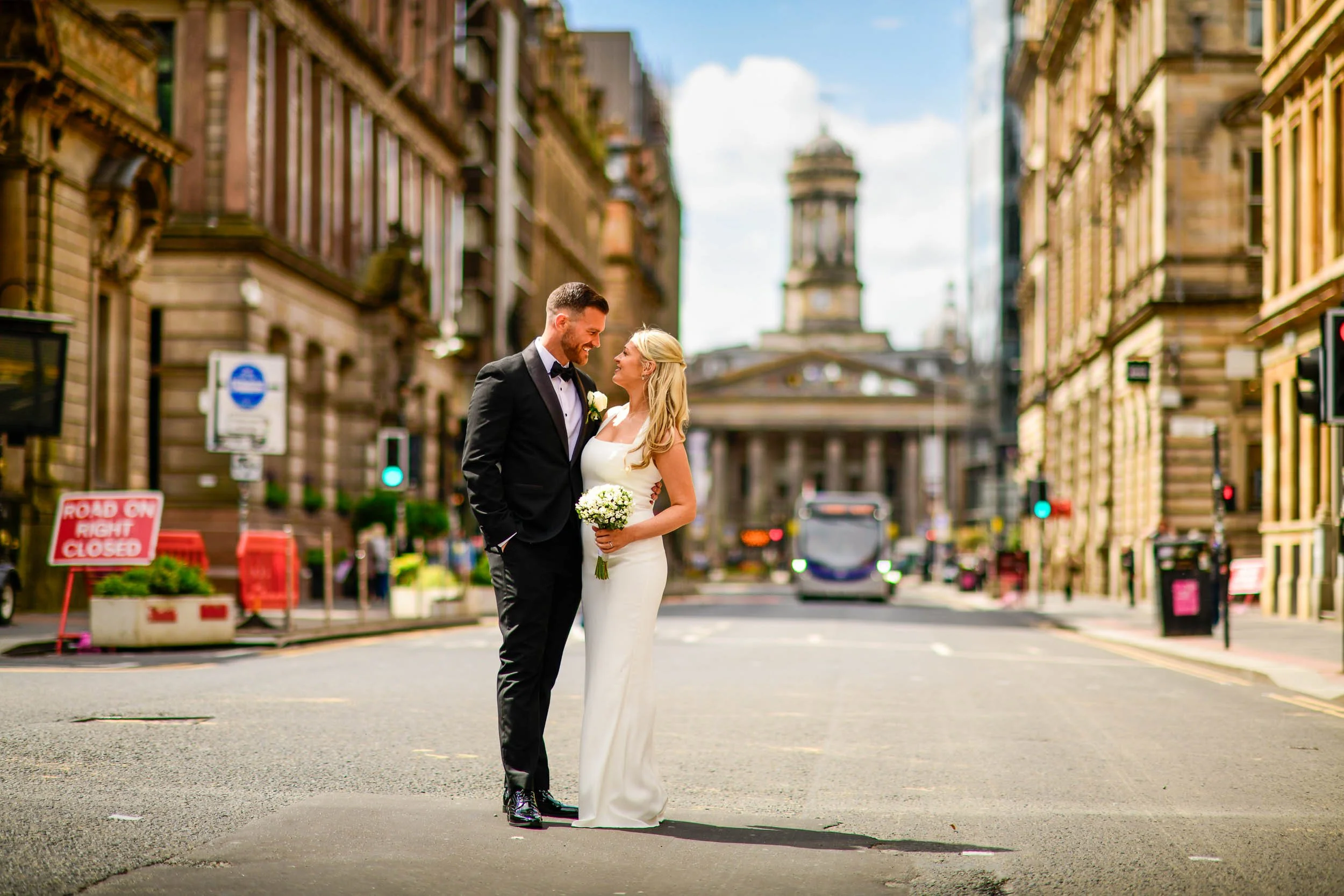 Glasgow City centre wedding with the bride and groom on Ingram Street shortly after getting married in the registry office at 23 Montrose Street.