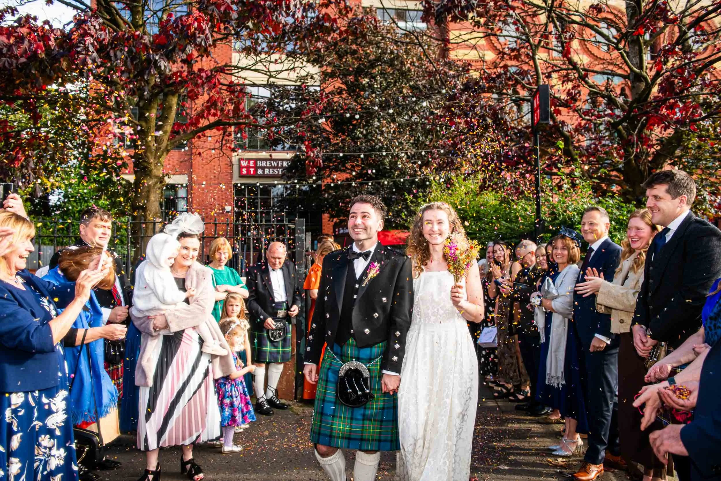 Confetti wedding photography with the newlyweds at West on The Green, Glasgow.