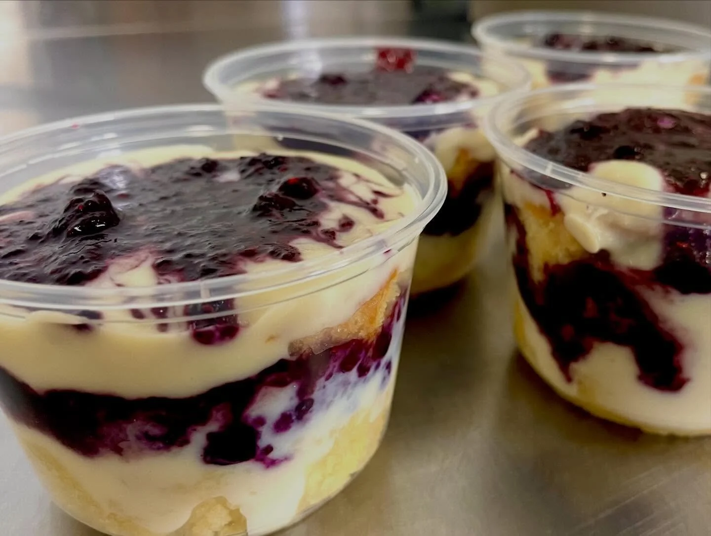NEW at our General Store: Lemon Berry Cake Parfait - layers of lemon cake, condensed milk cream and berry compote. Also new, Coconut Almond Yogurt Granola Clusters 😋😋😋