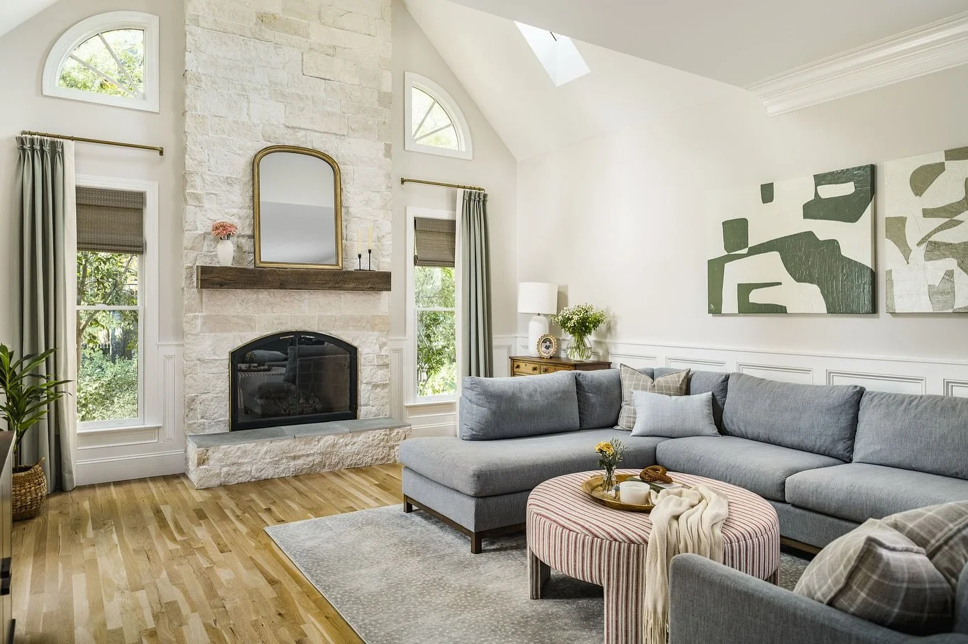 One of my favorite things about our family room is all the natural light it gets. It&rsquo;s an interesting space with two ceiling heights to consider, but it adds to the character.

We replaced the carpet with white oak hardwoods, swapped the brick 