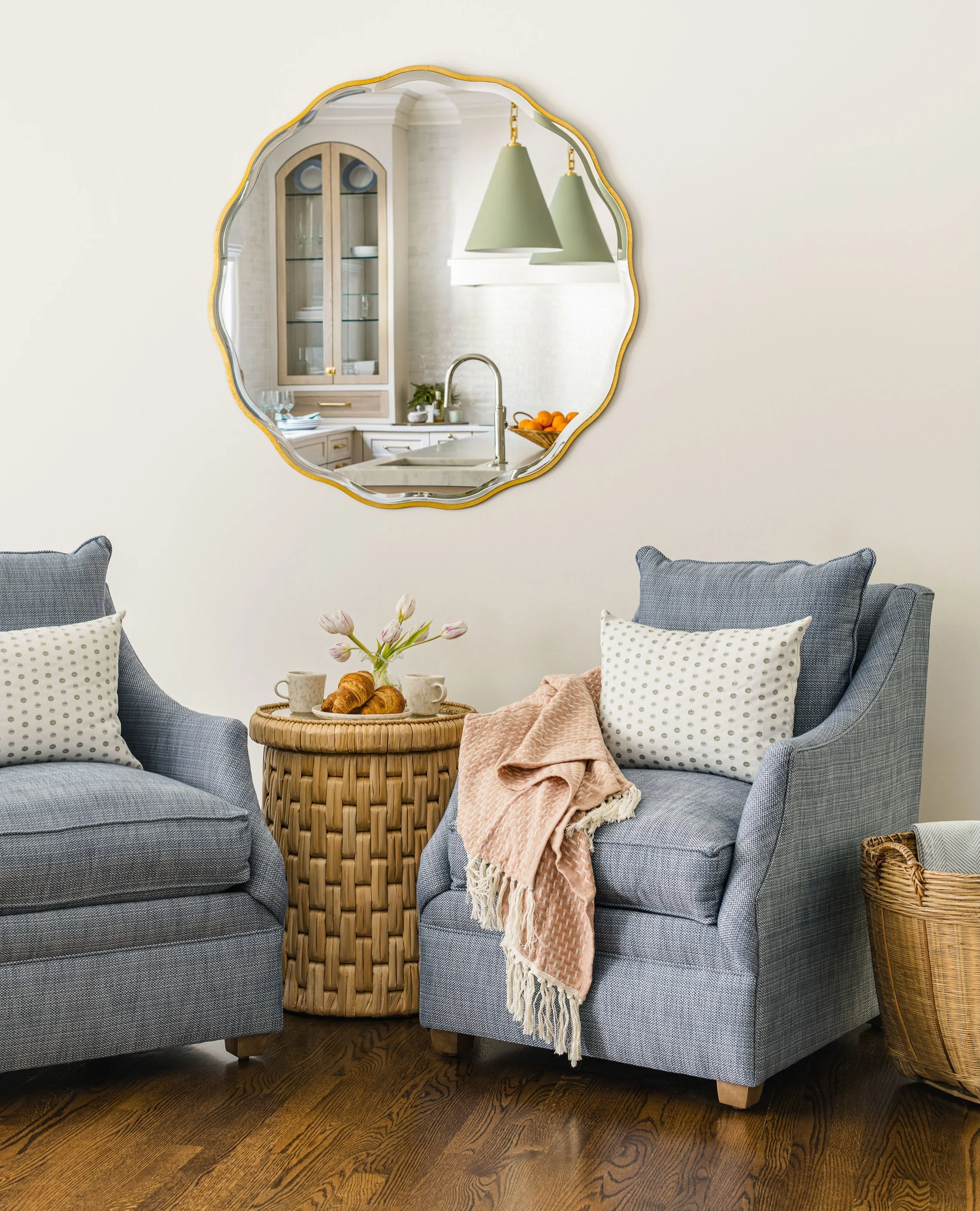 In #TheFoxcroftEdit project, our clients wanted a comfortable place to enjoy their morning coffee. ☕️

We opted to swap out their kitchen table for these soft blue lounge chairs and woven side table to create a cozy corner perfect for starting each d