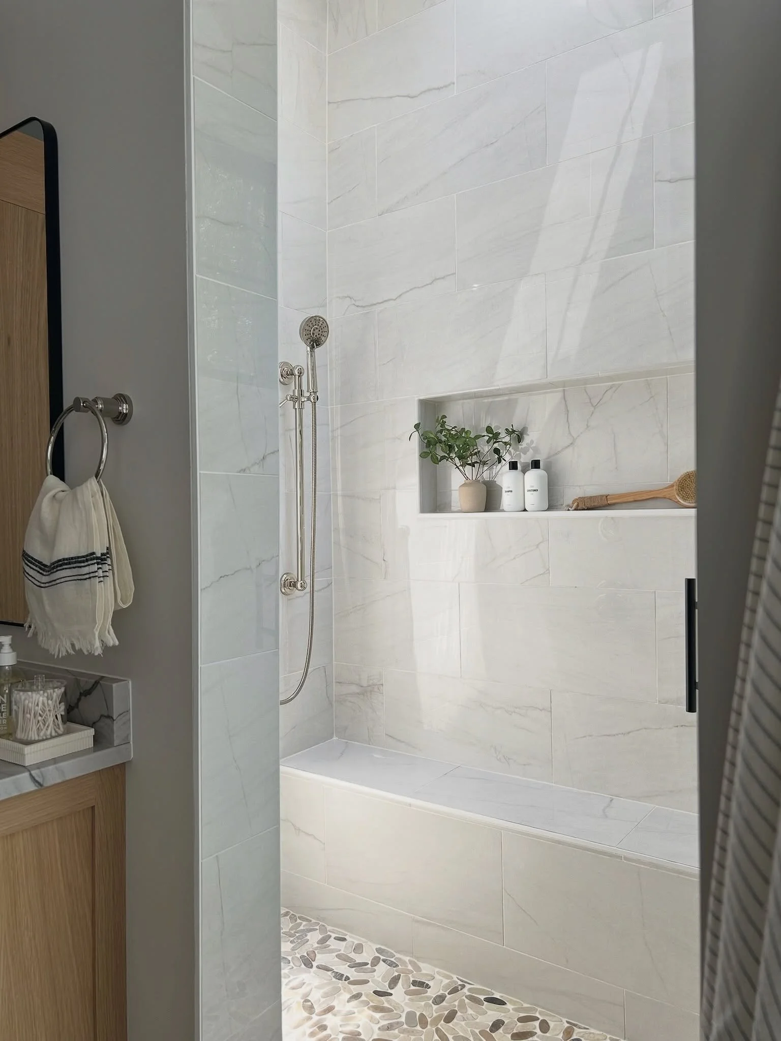 A walk-in shower designed for a little everyday luxury. 🚿

Primary Bathroom Design | Charlotte Bathroom Design | Charlotte Bathroom Remodel | Charlotte Interior Designer | Charlotte Interiors | Charlotte Home Design | Transitional Bathrooms | #charl