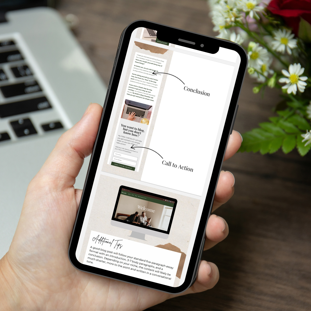A person holding a smartphone displaying a webpage with sections labeled 'Conclusion,' 'Call to Action,' and 'Additional Tips,' including images and text. In the background, part of a laptop and some flowers are visible on a wooden surface.