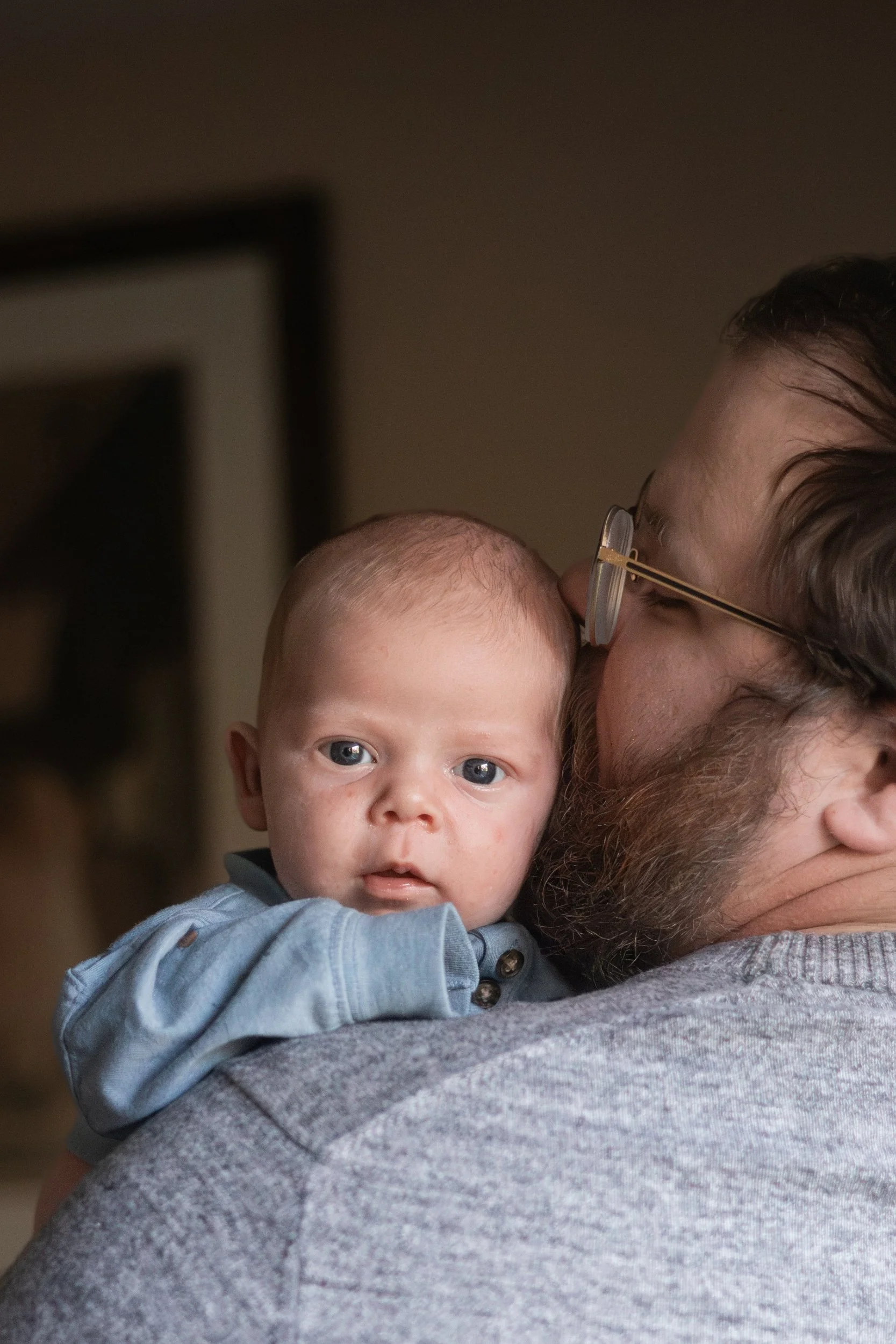 dad and baby Lifestyle newborn family photography in uxbridge ontario