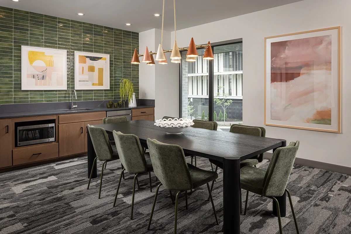the-finch-apartments-communal-area-alfred-green-upholstered-chairs-landscape.jpg