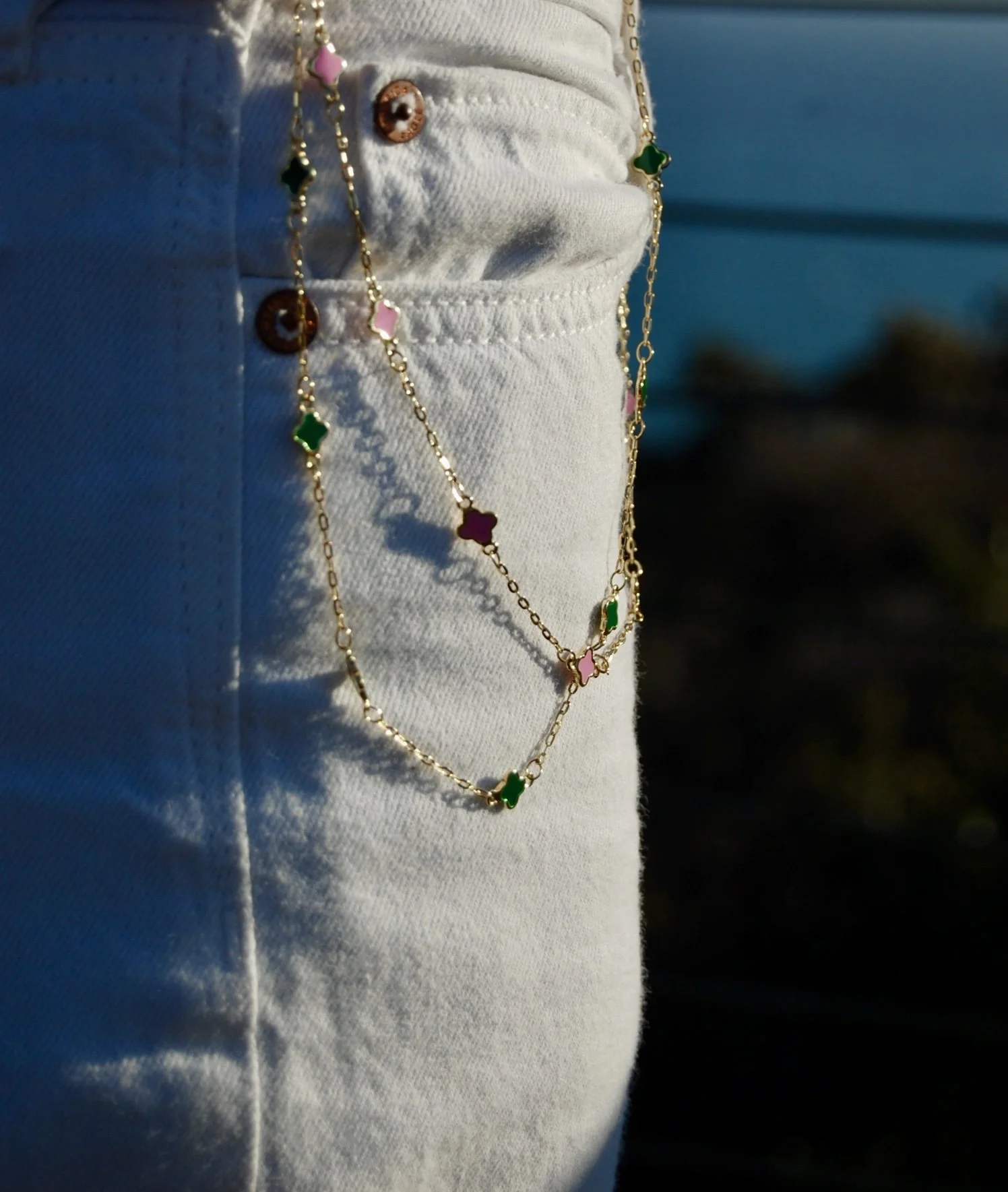 green and pink hanging on jean.jpg