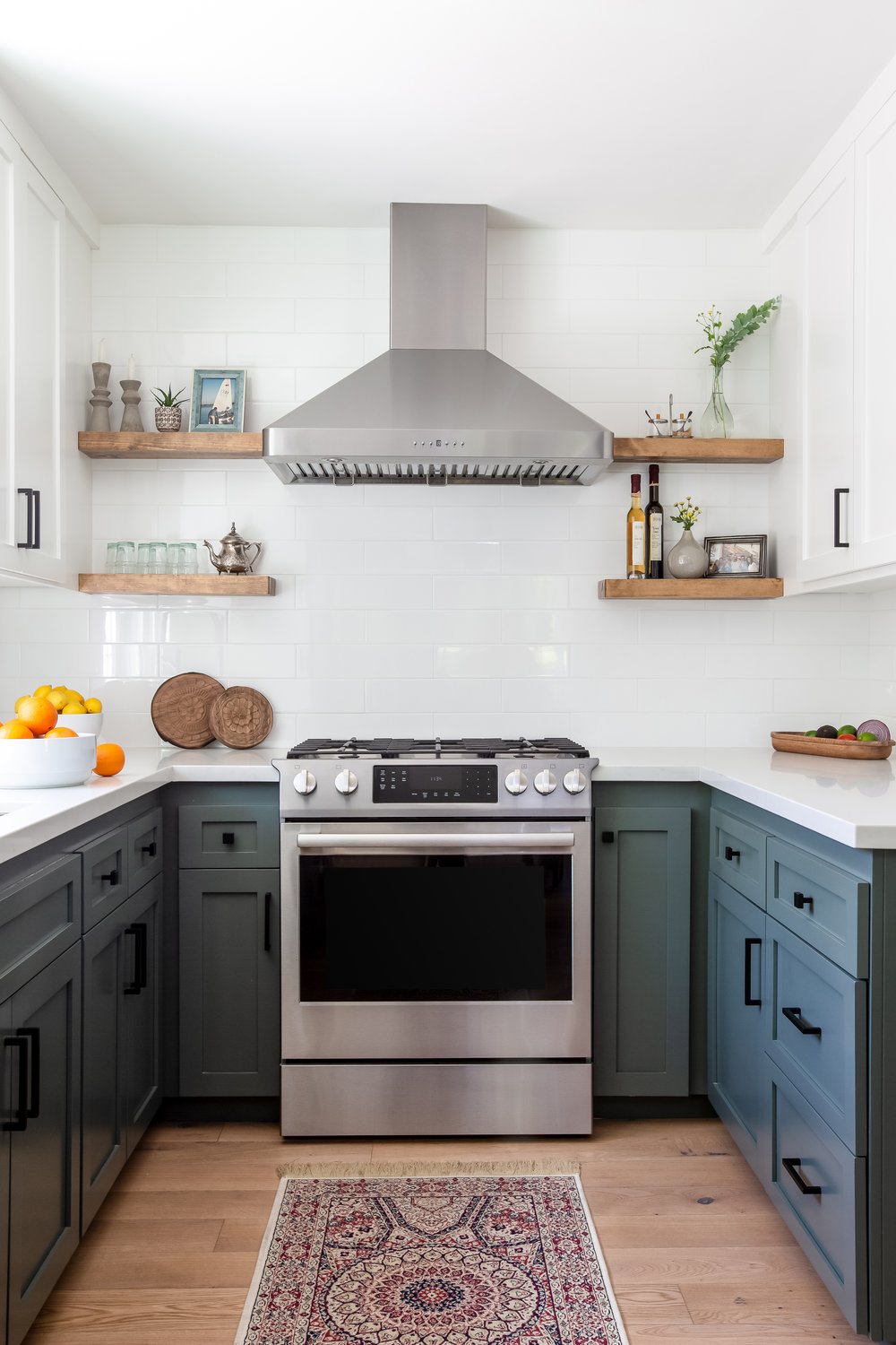 Small knobs work great on these small drawers and a mix of pull applications add to the modern, eclectic flair of the space. 