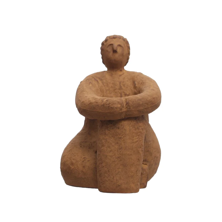 stoneware-woman-sitting-sculpture.webp