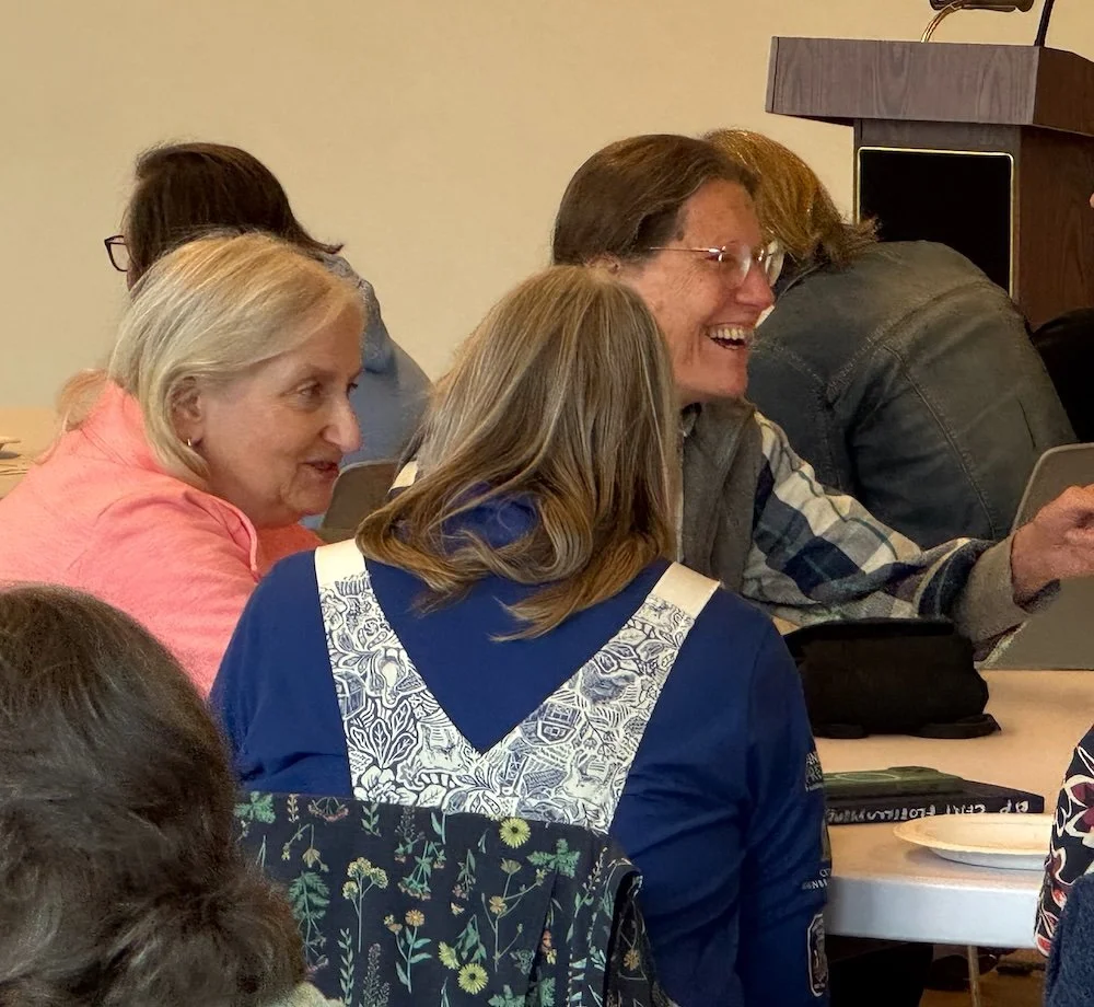 Volunteers talking and laughing