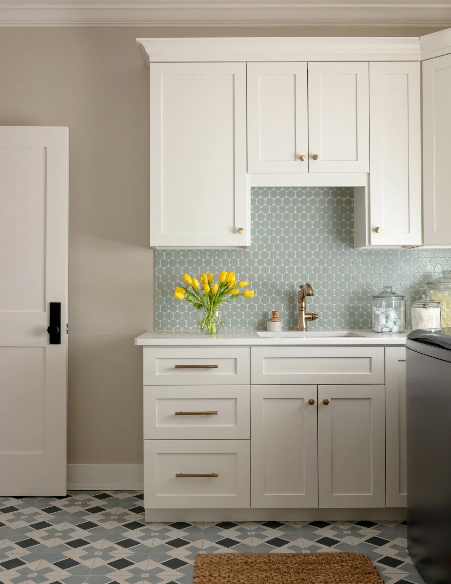 Happy National Laundry Day! Apparently, it's a real thing! 🧺

We think laundry day is a little more bearable when the space is cute. Good storage, a sink that earns its place, tile that makes you smile every single time. These two rooms are proof th