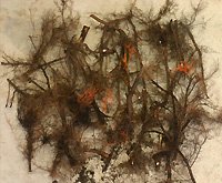 Collection of dried leaves and twigs on a surface.