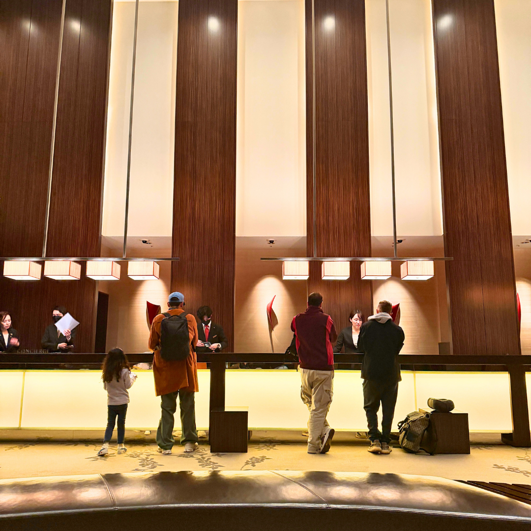 nside Conrad Tokyo lobby during check-in