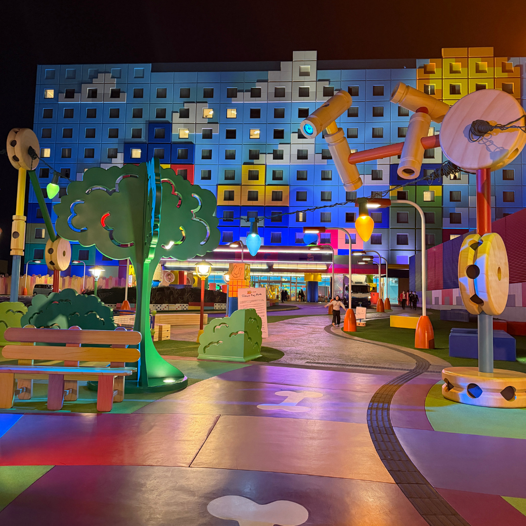 Colorful outdoor play area with oversized Toy Story figures at Tokyo Disney Toy Story Hotel