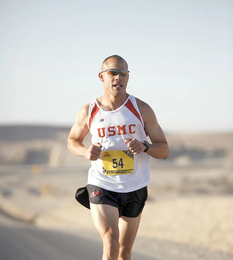 Male athlete running in a race