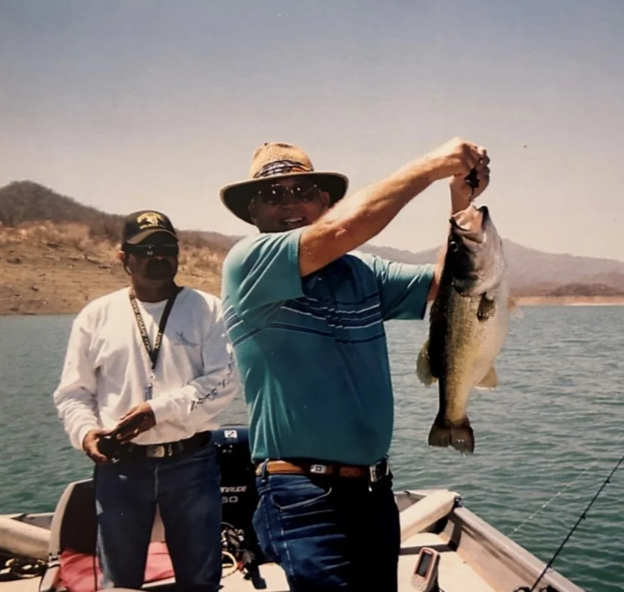 Richard catching a fish.