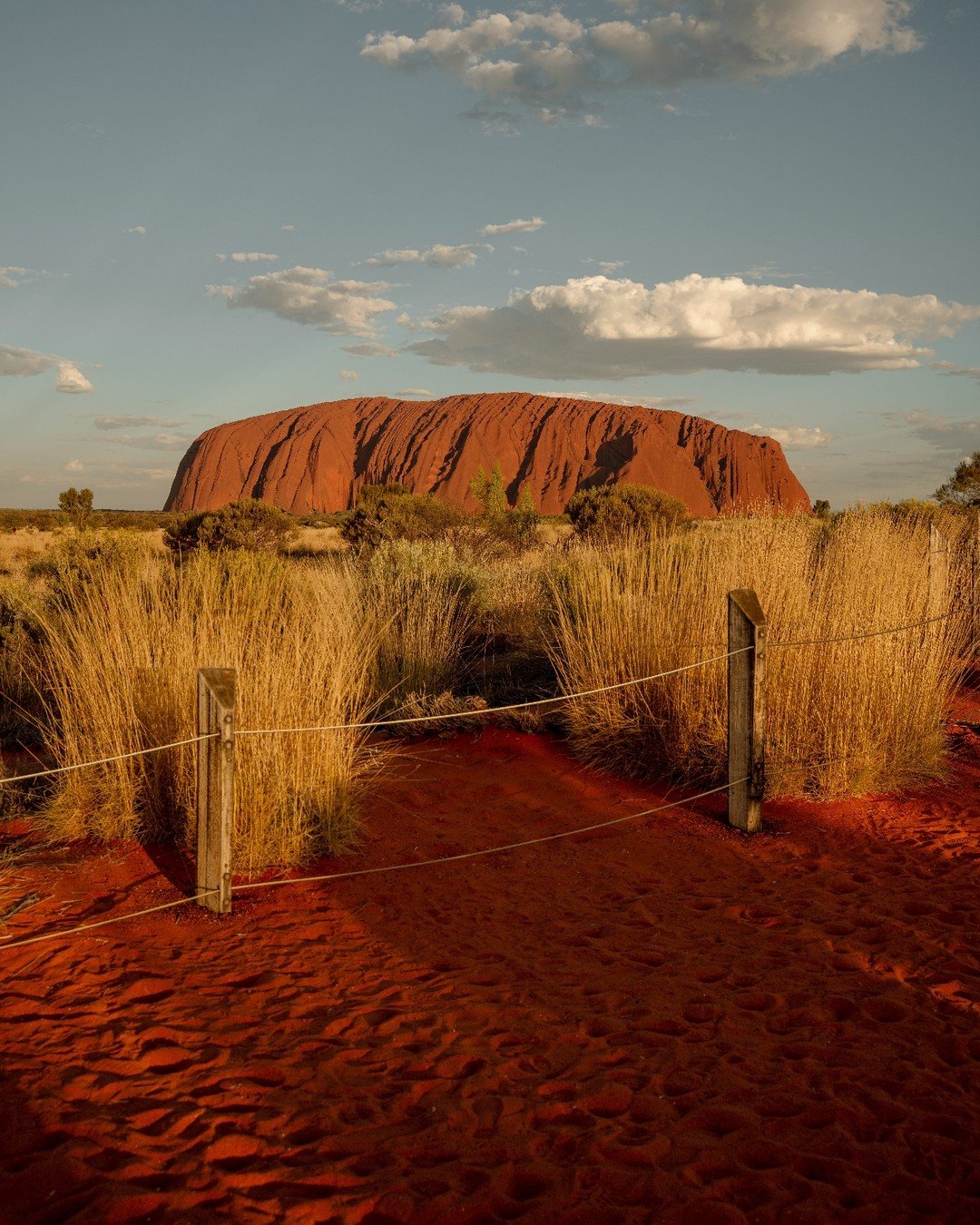 Rising from the red heart of Australia, Uluru and Kata Tjuta are more than icons — they’re living landscapes that hold deep cultural and spiritual meaning.
Whether you’re watching the desert glow shift with the light or walking amo