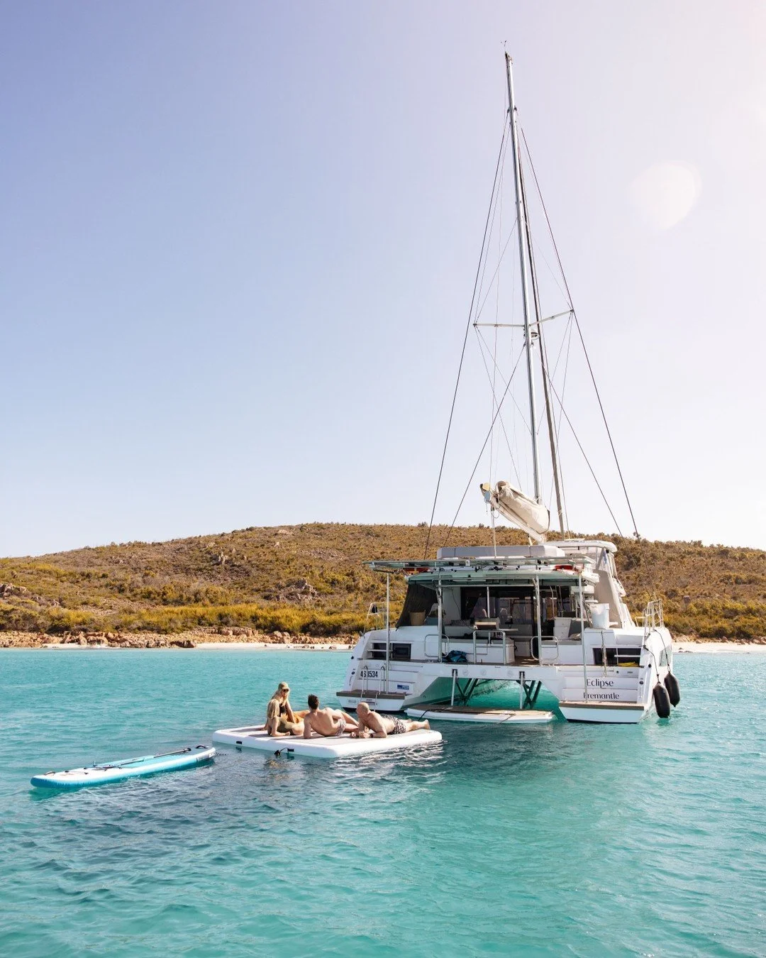 At Eagle Bay, the calm ocean reflects the fading sun as South West Safaris' guests unwind on the pontoon of their boat, Eclipse. The coastline stretches quietly, the only sounds the gentle lapping of waves and the occasional call of seabirds.

Moment