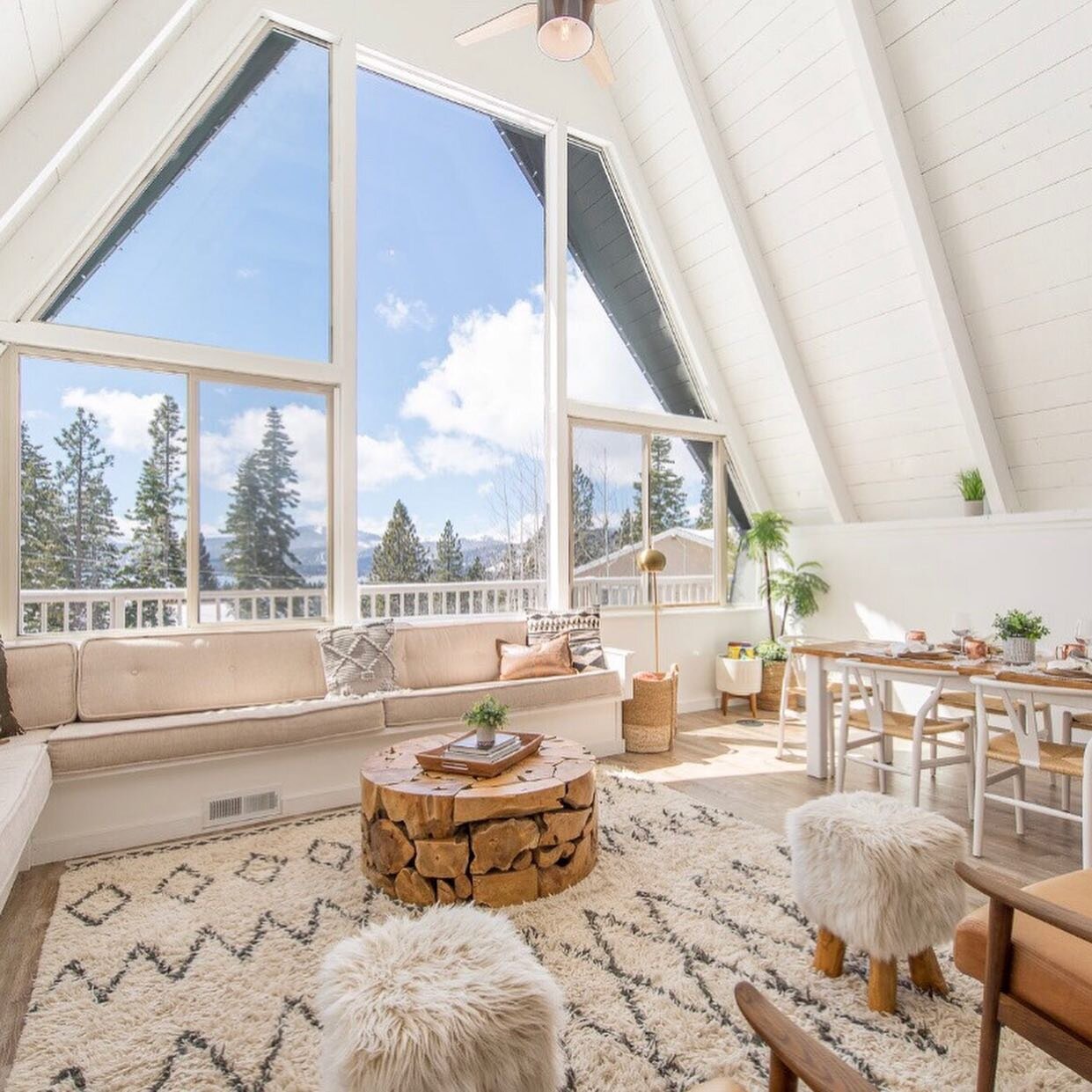 The best part of an Aframe is hands down the glorious oversized windows and giant vaulted ceilings! A close second is the floor to ceiling wood paneling. Within our cabin community here on IG, there is a friendly debate of &ldquo;to paint or not to p
