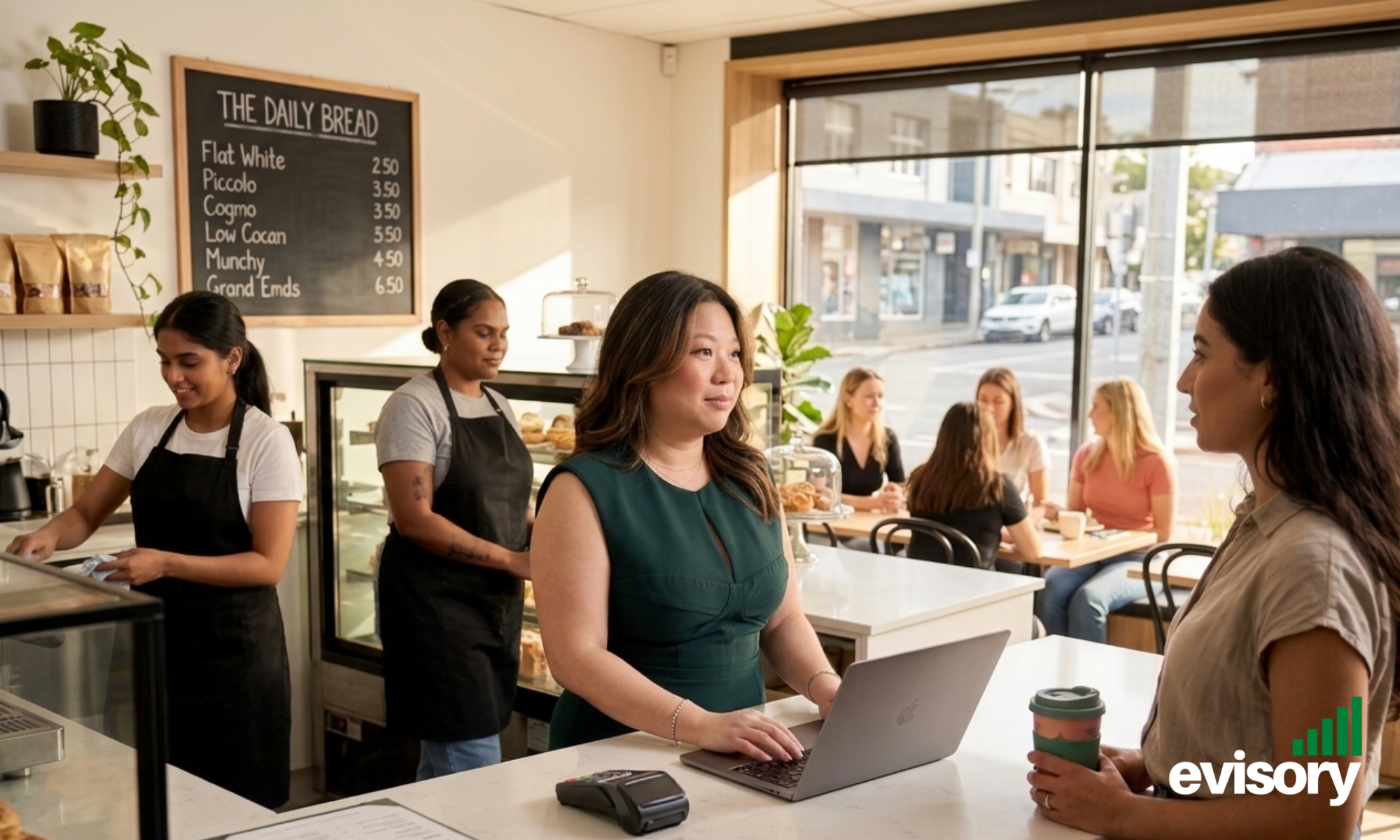 Australian hospitality business owner reviewing payroll and staff wage reports after restaurant service