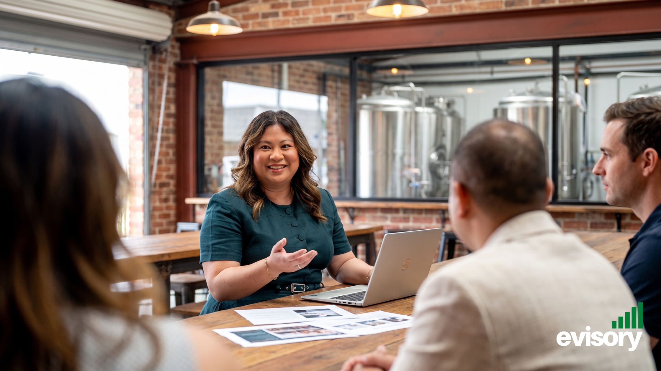 Linda Dang speaking with clients during an accounting consultation on WFH benefits, ATO compliance, and FBT risk management.