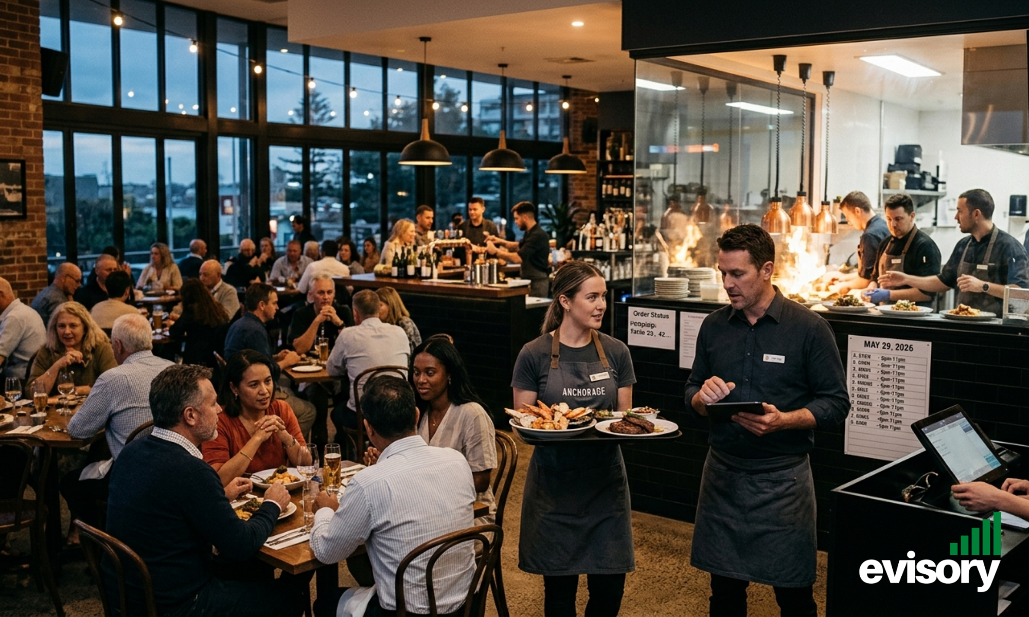 Hospitality staff working busy evening restaurant service in Australia