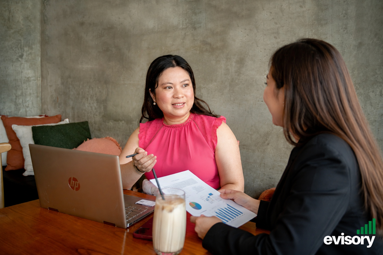 Linda Dang, Evisory Accountants CEO, talking to a female client