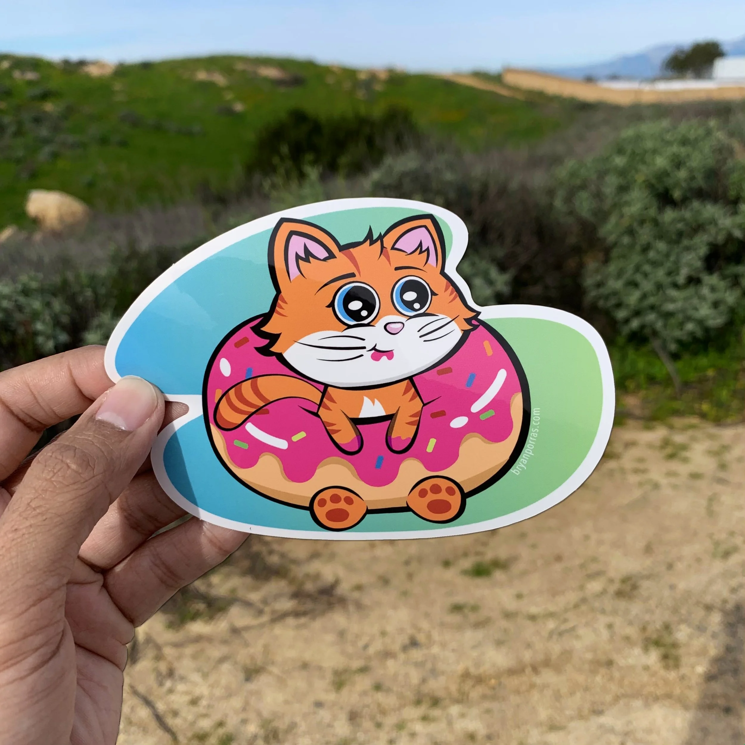 Cat Eating Donut Sticker (5"W X 3.6"H)