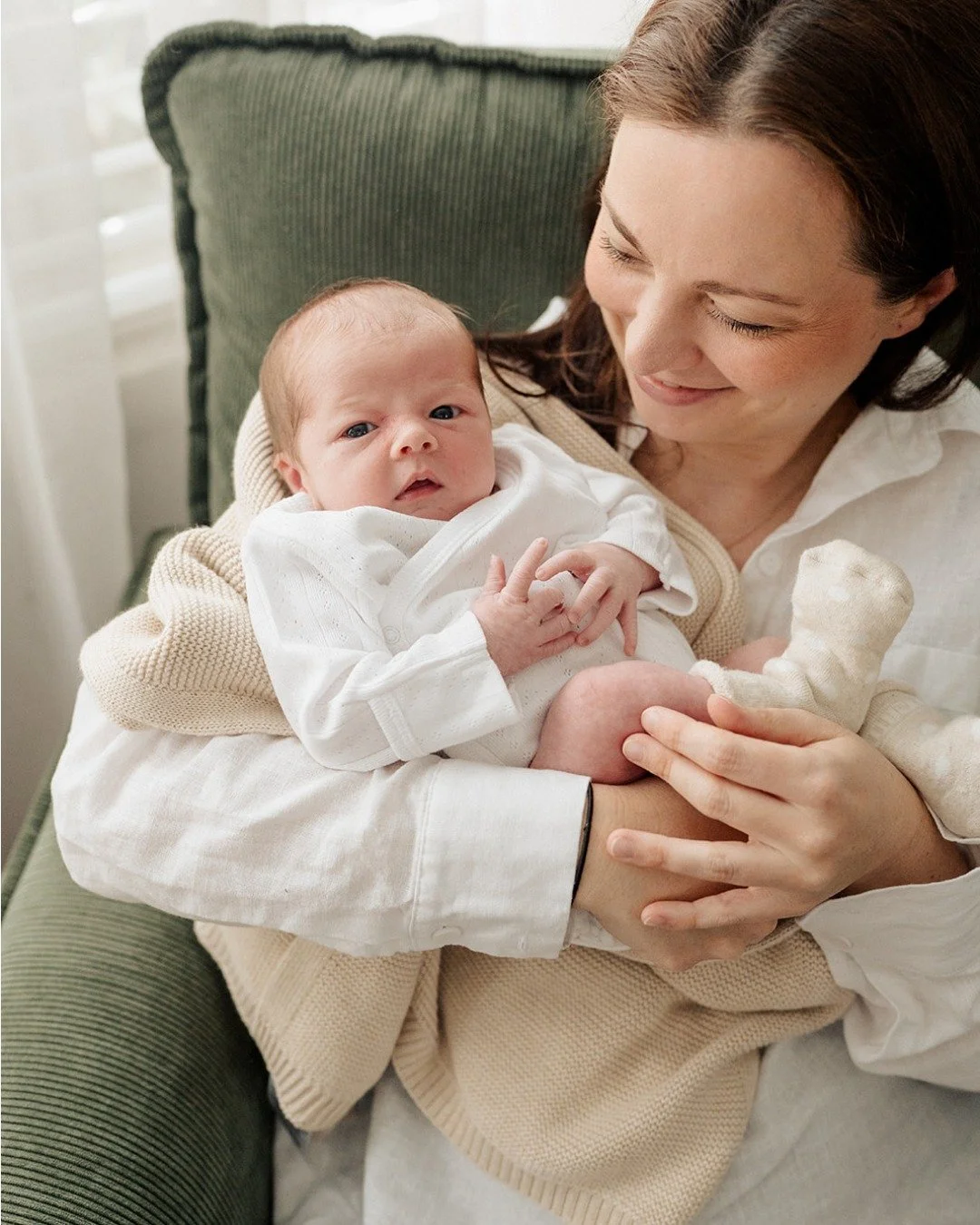 Newborn photos&hellip; but make them you.

In your home. In your clothes (and your spare ones - hello baby spit up). Your nursing chair. Your bed. All those little things your baby needs, right within reach - because you&rsquo;re exactly where you&rs