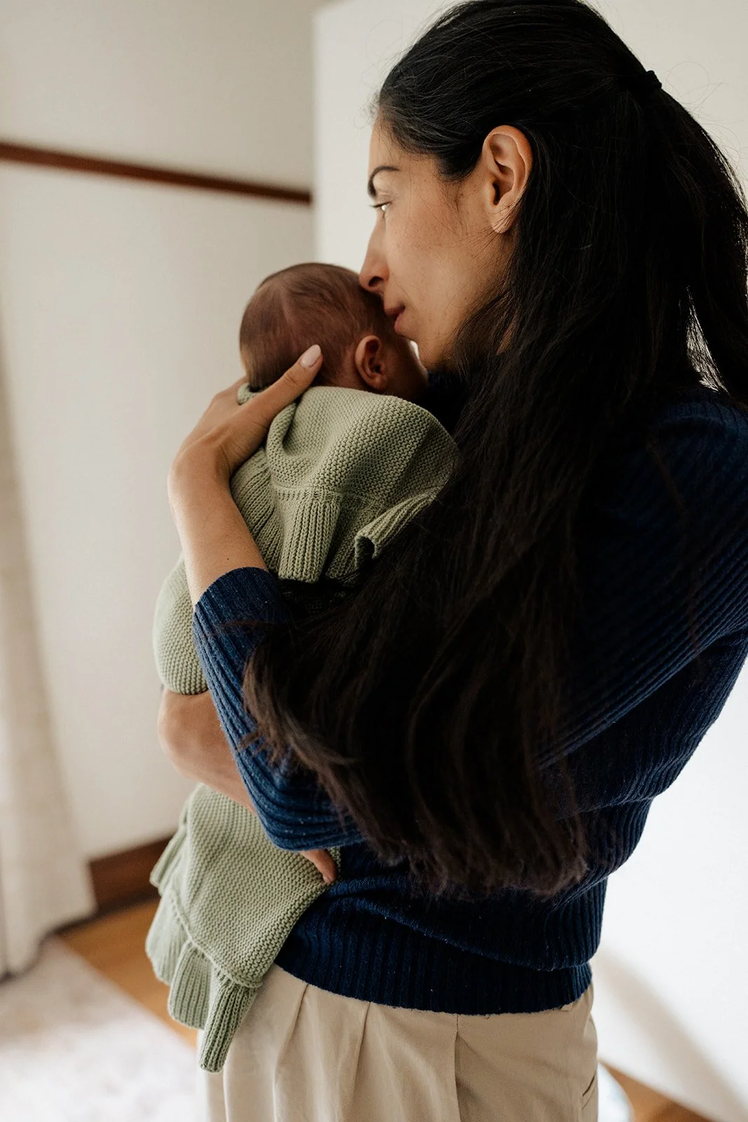 Newborn hug with mum.jpg