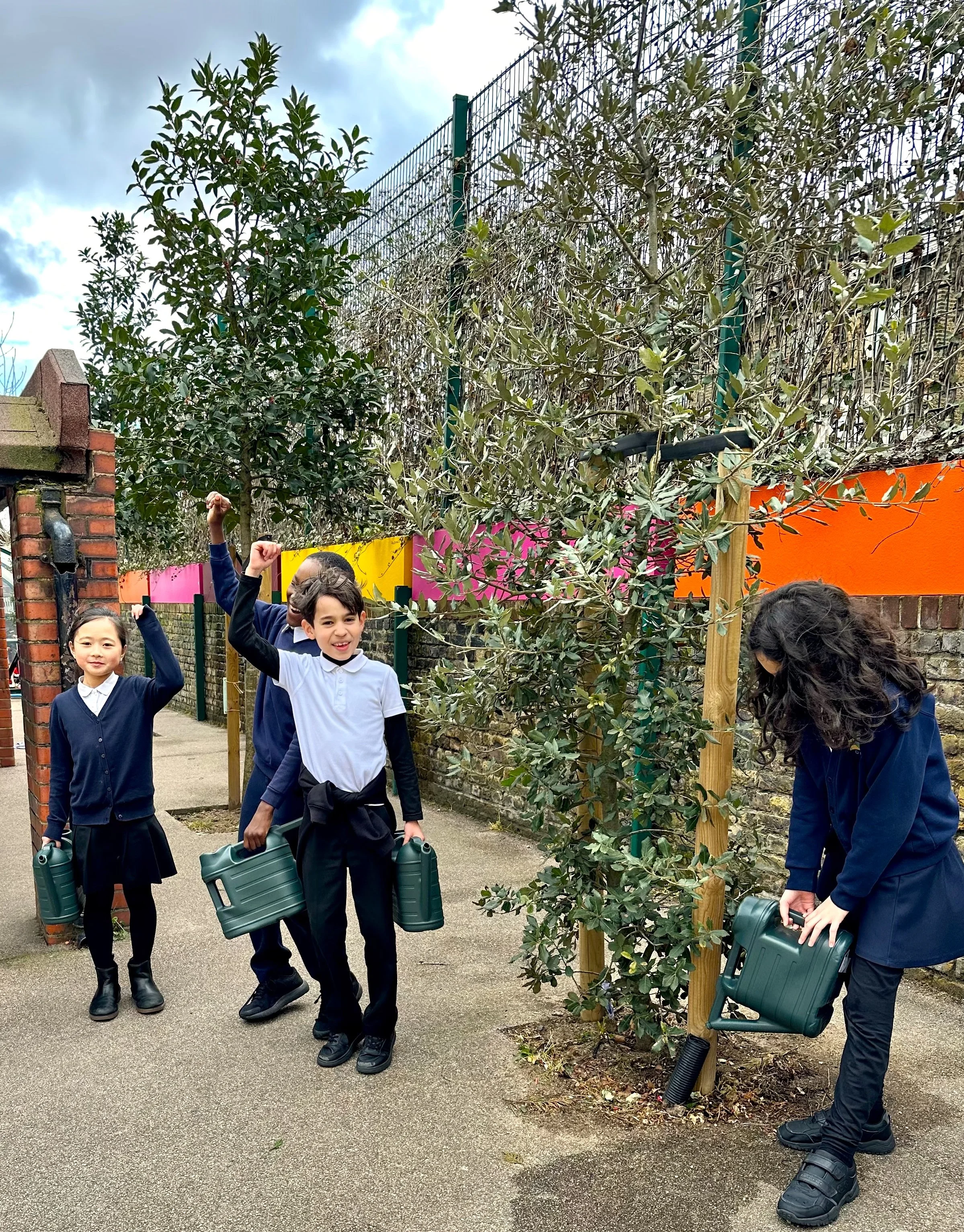 Deptford Park - 4 kids watering and cheering 2.jpg