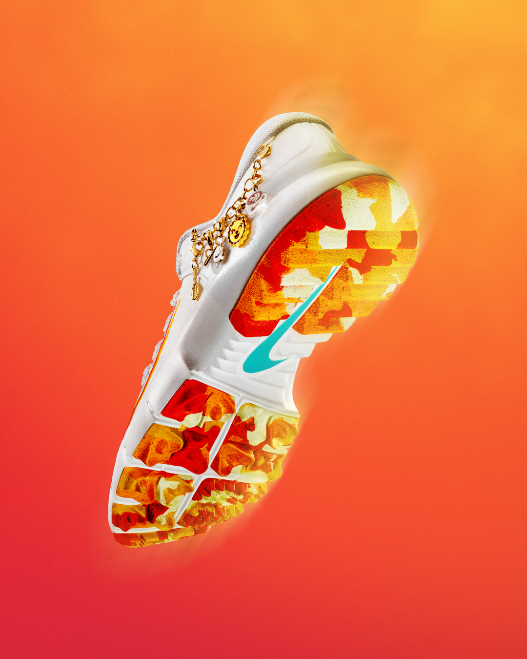 NIKE_NellyKorda-PE_04_Angle-Sole-wCharms.png