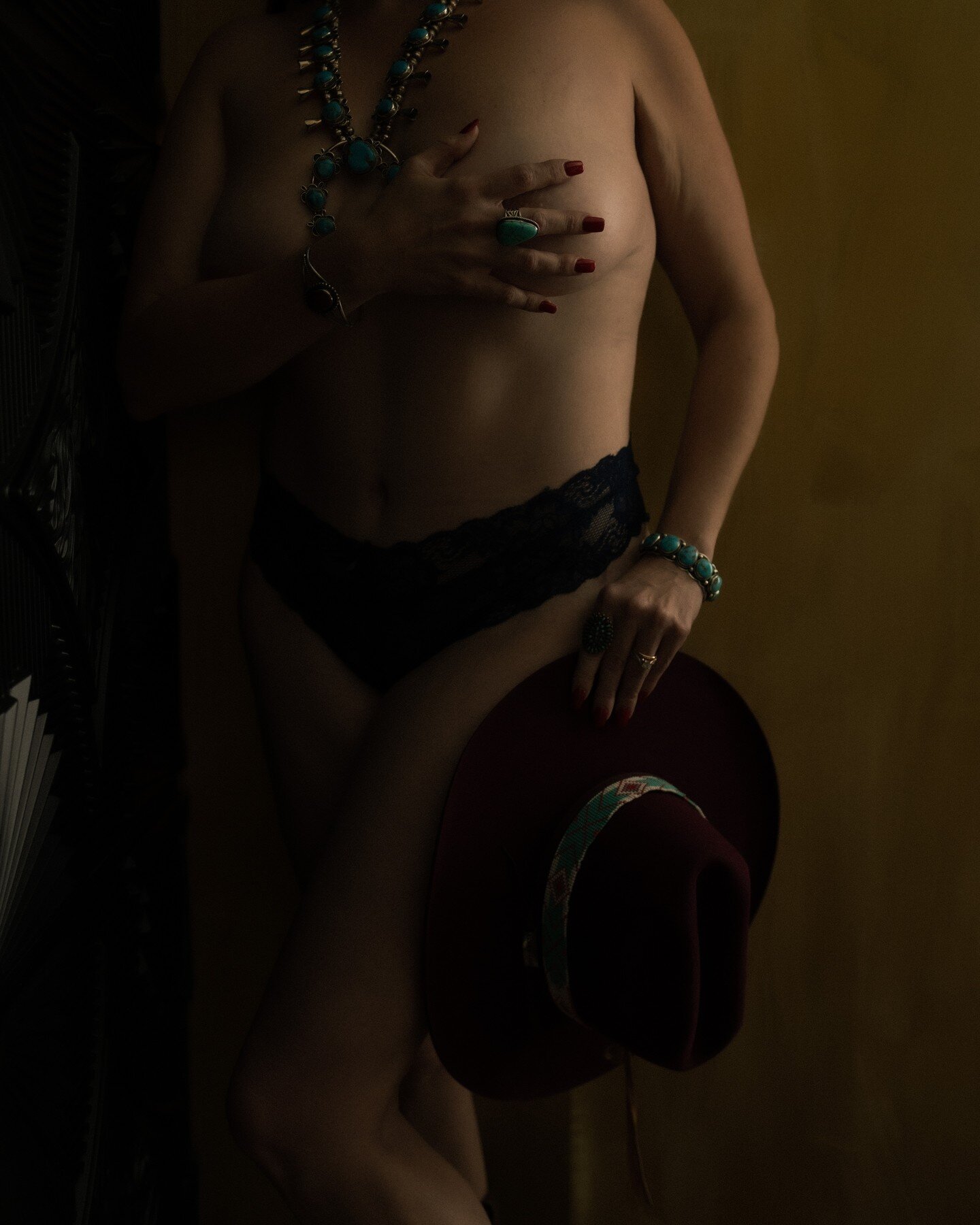 It's been a hot minute since I've dropped in and I'm excited to share this image with you. Look closely, and you'll catch a glimpse of a story woven into the details. 

In this shot, she's holding a cowboy hat like it holds a delicious secret, adorne