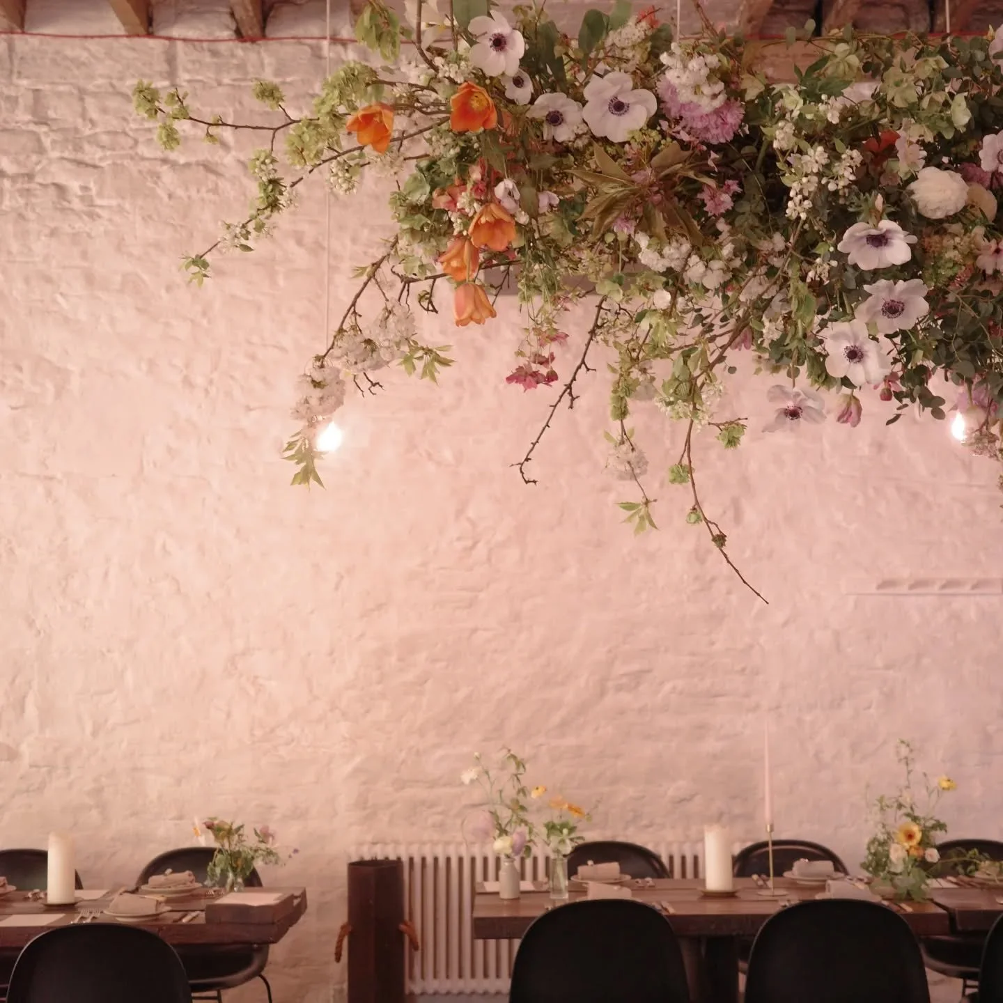 A cloud filled with spring blossom, tumbling tulips and dancing anemones. All installed the beautiful dining space of @timberyard10 for D+T's sunny April wedding last week. 

Little bowls and bottles of springtime lined the tables, and the tiniest, g