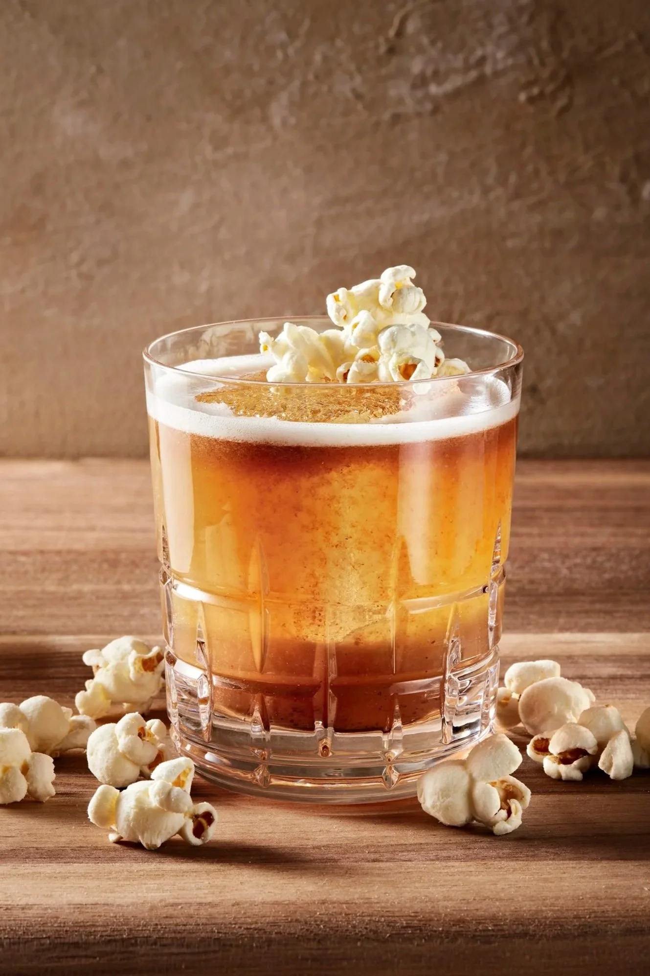 Whisky cocktail with foam and popcorn as garnish - shot for whisky advocate magazine, photographed by Jeff Harris - food styling, commercial food stylist NYC