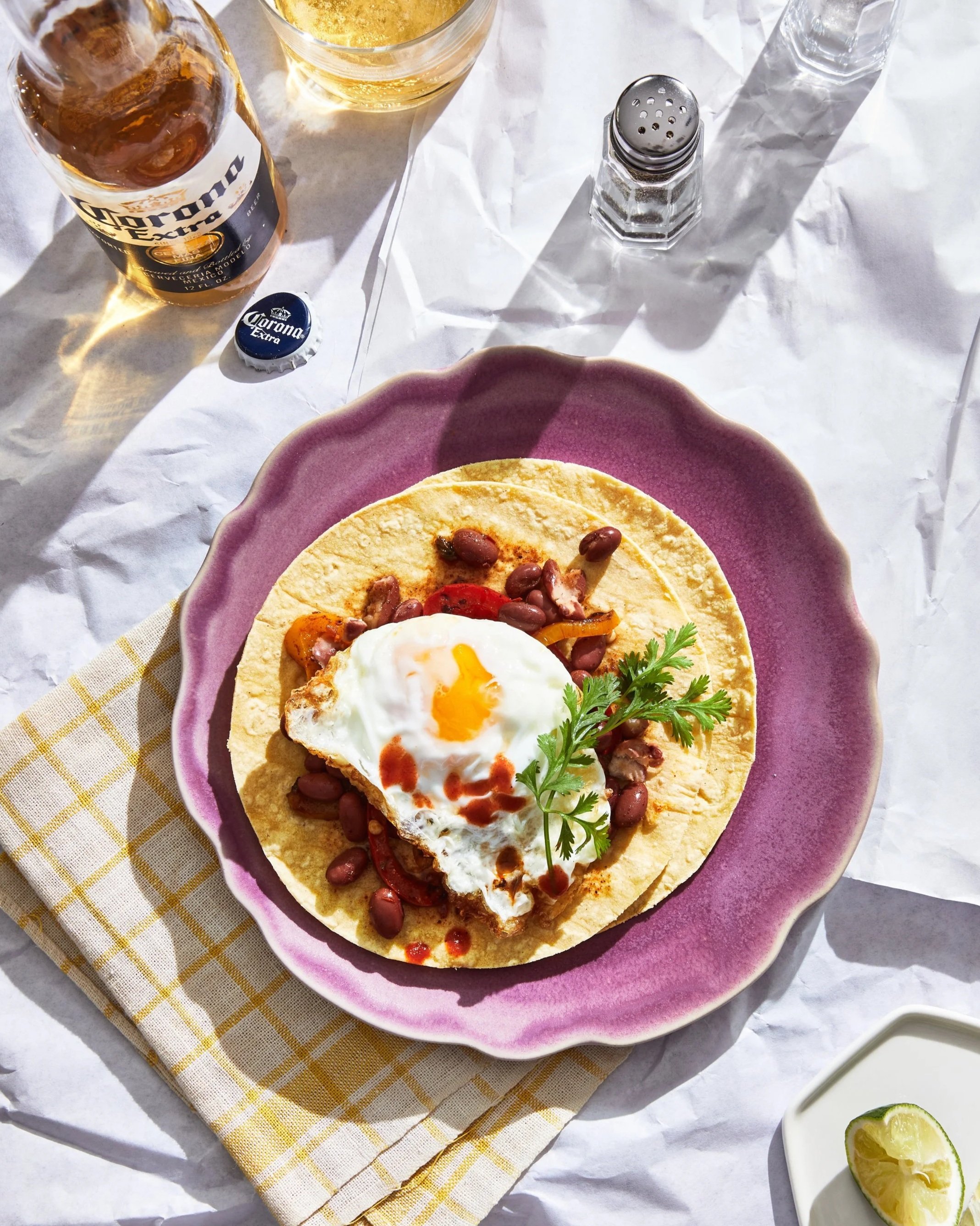 Midday surface scene with a fried egg taco and chorizo - for a test concept shoot and photographed by Dane Tashima - food styling, commercial food stylist NYC