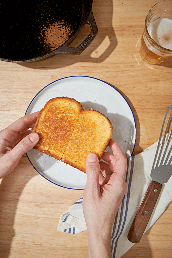 Grilled cheese with a cheesy pull shot in stop motion - food styling, commercial food stylist NYC